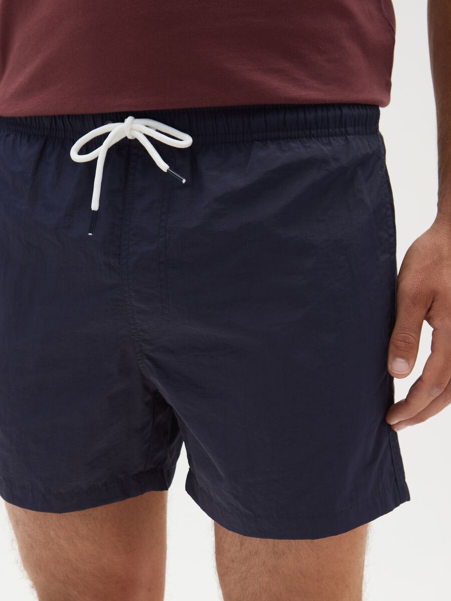 Costume da bagno da uomo blu regular fit con tasca_2