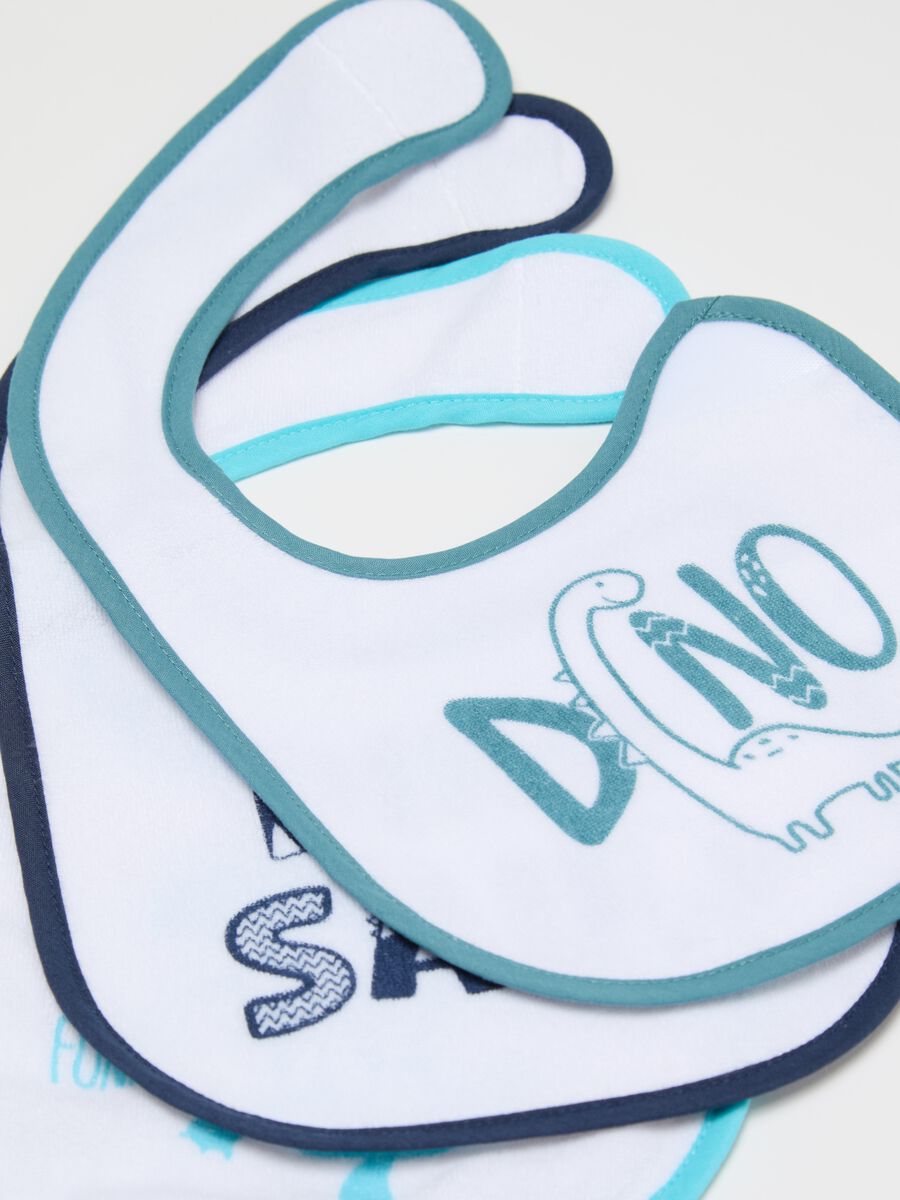Three-pack bibs with PEVA backing and dinosaur print_1
