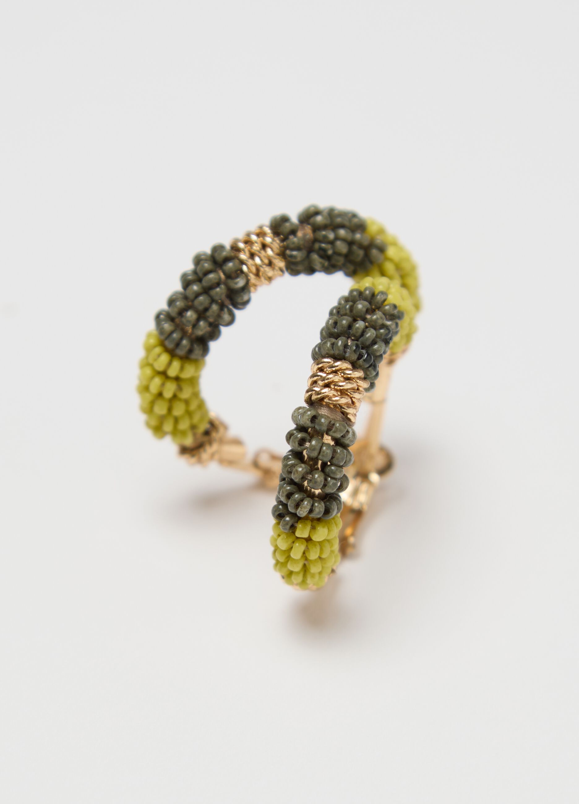 Hoop earrings with green and yellow beads