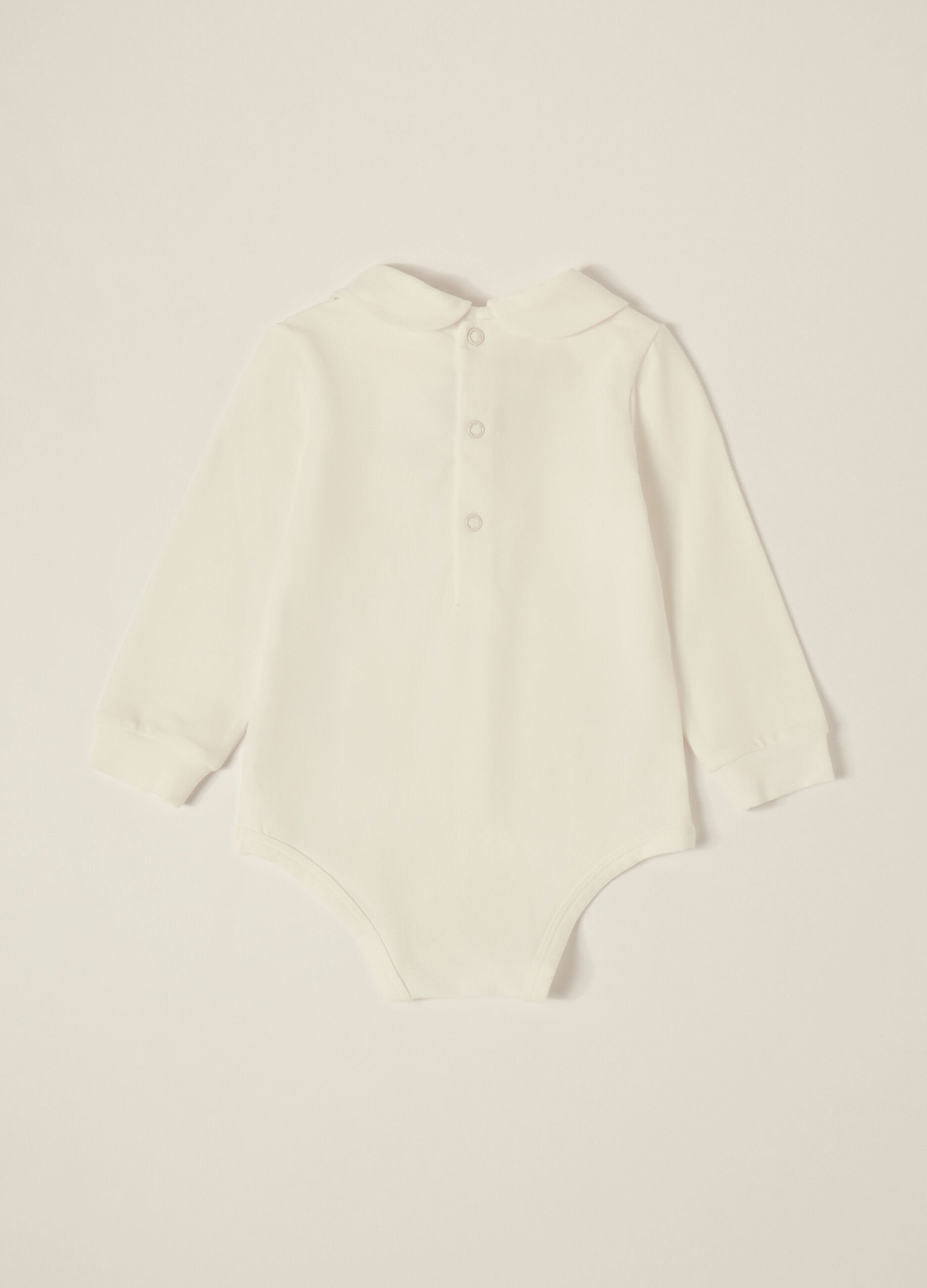 Body bianco con papillon per neonato