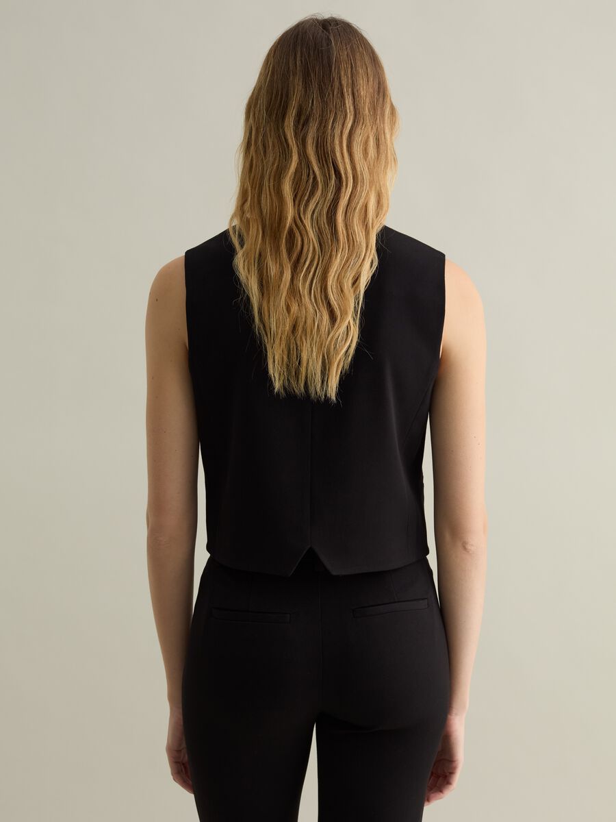 Solid colour waistcoat with buttons_2