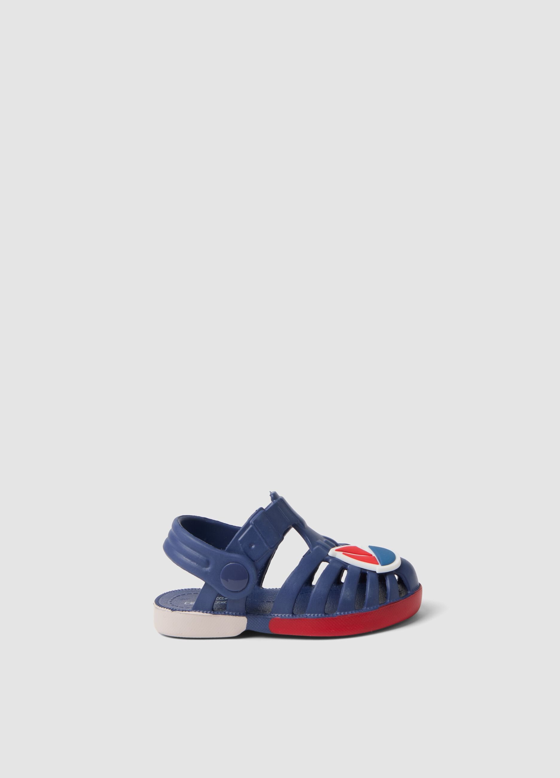 Blue beach sandals with little boat motif