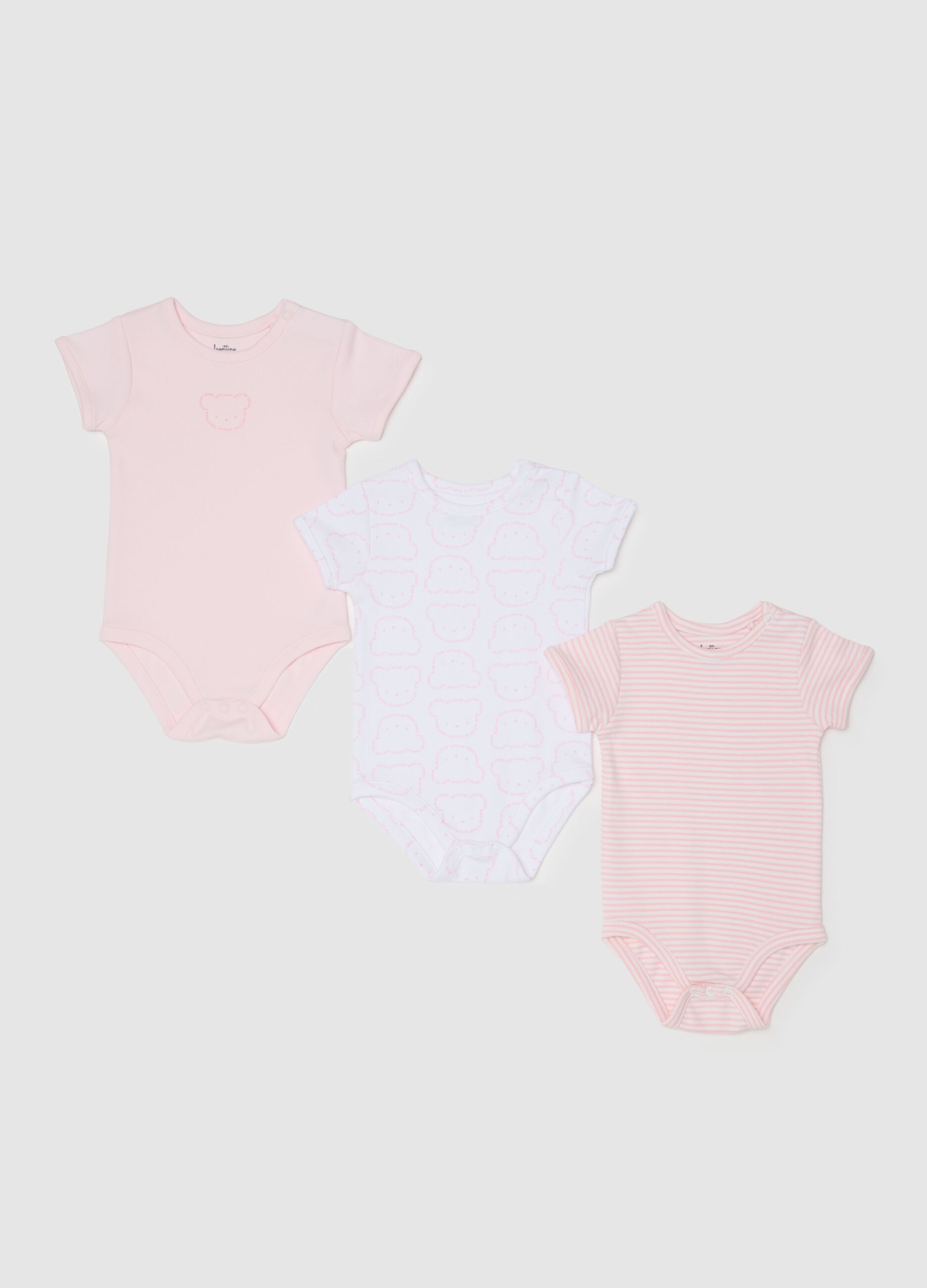 Set of three baby girl cotton bodysuits in multicolour