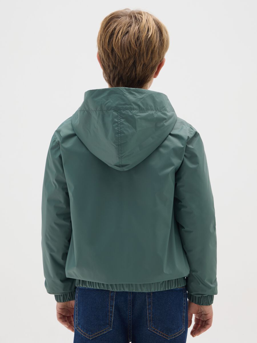 Boy's jacket in green water-repellent_1