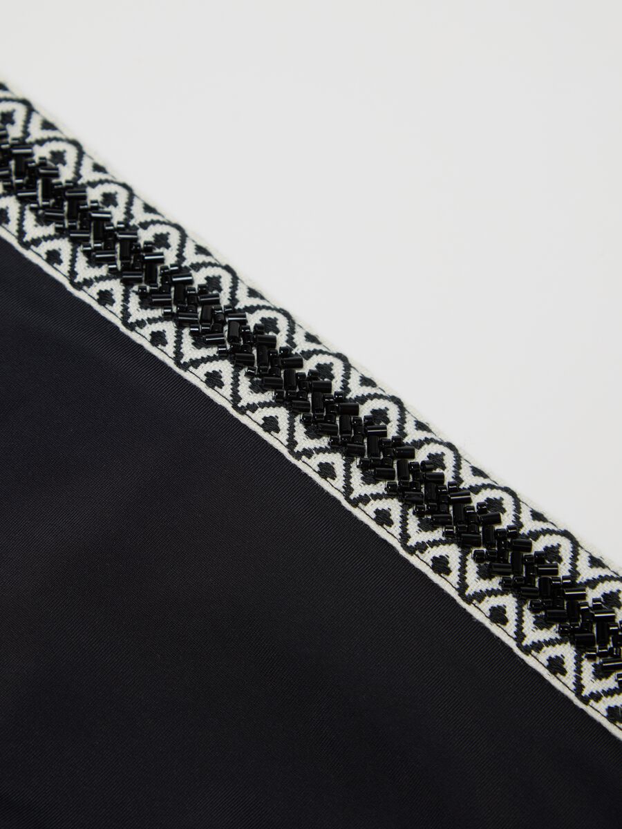 Women’s briefs in black stretch fabric with decorative band_1