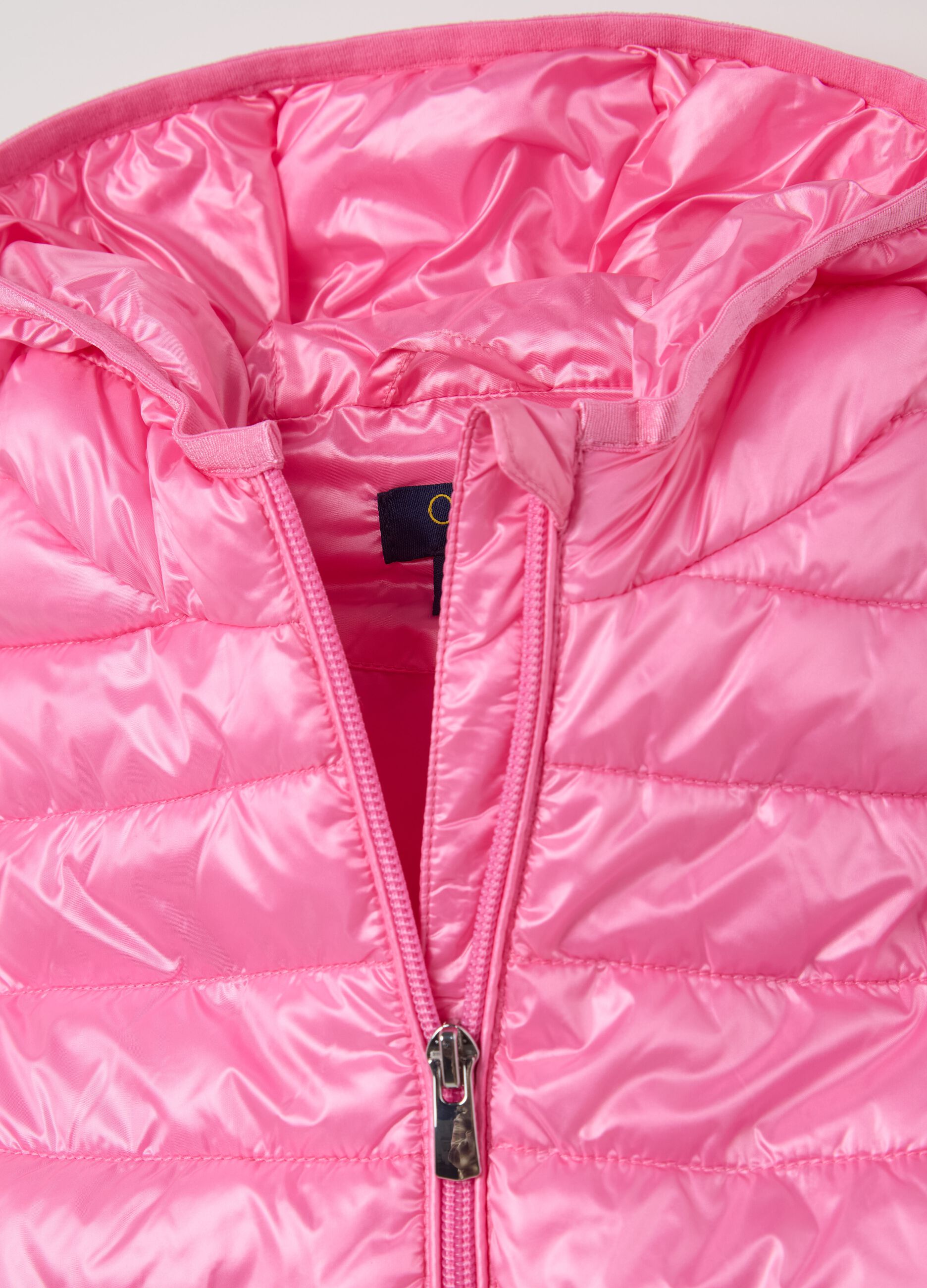 Pink gilet with hood and unicorn
