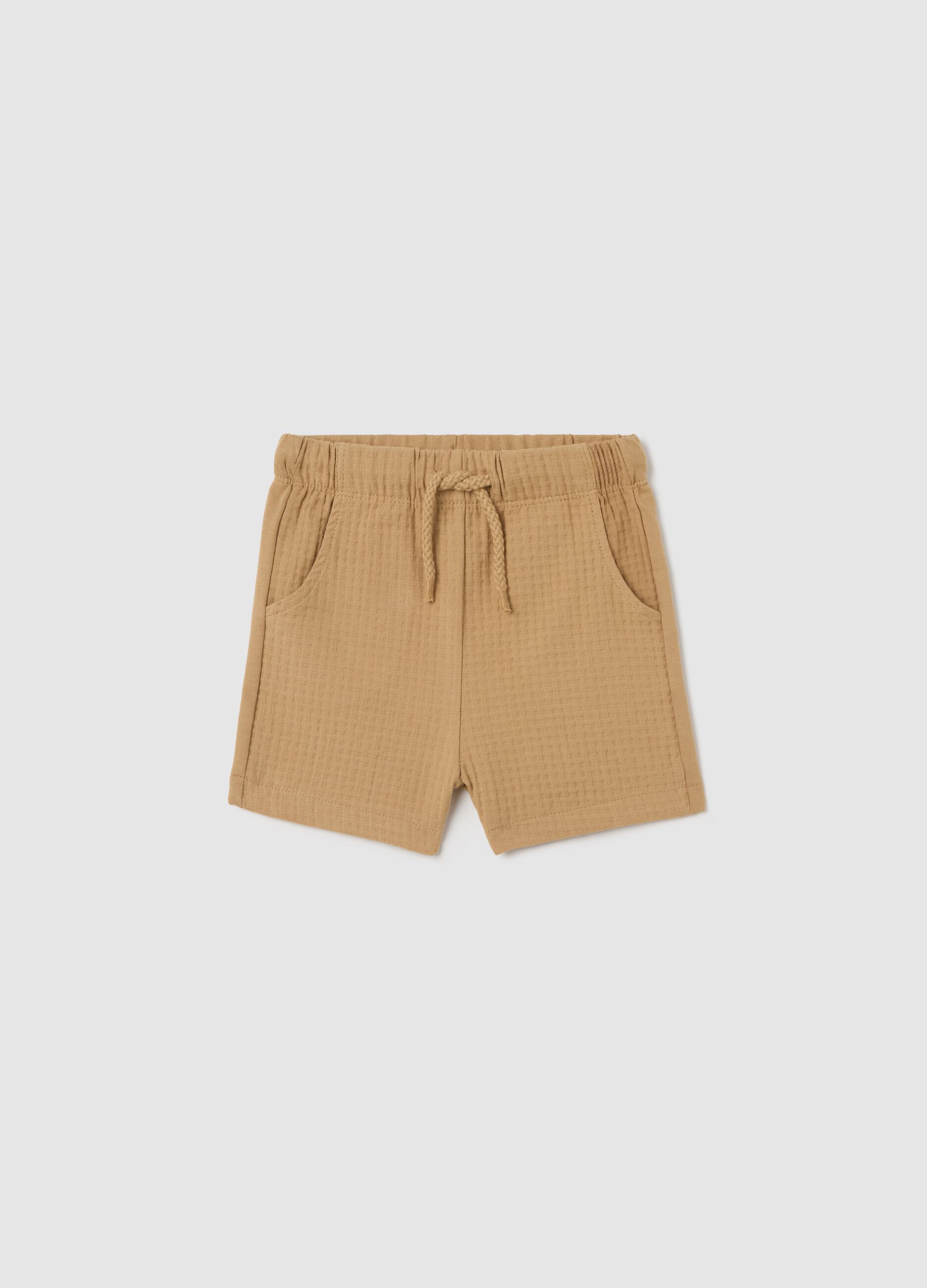 Beige Bermuda shorts with drawstring and waffle weave