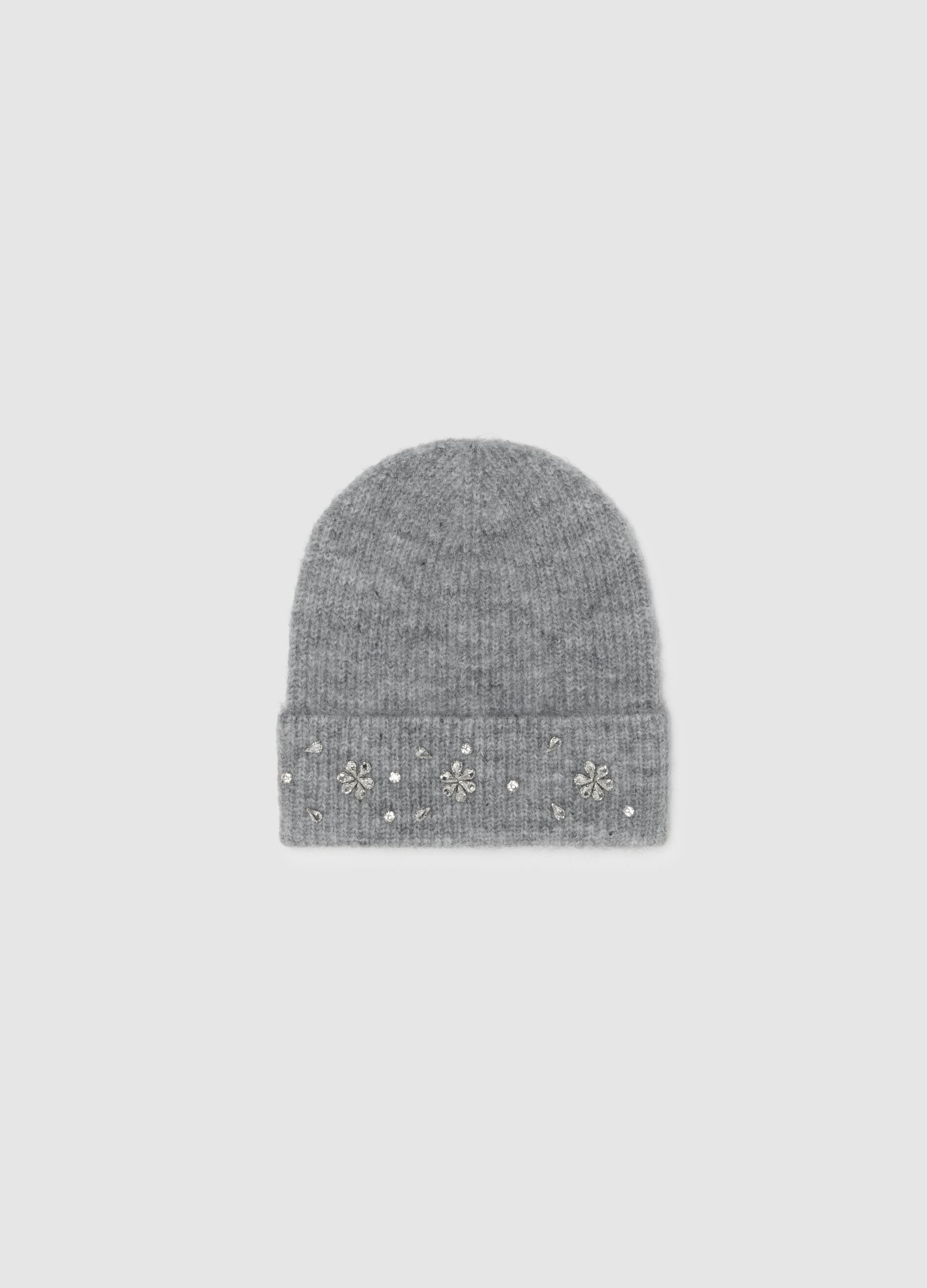 Grey knitted beanie hat with embellishments