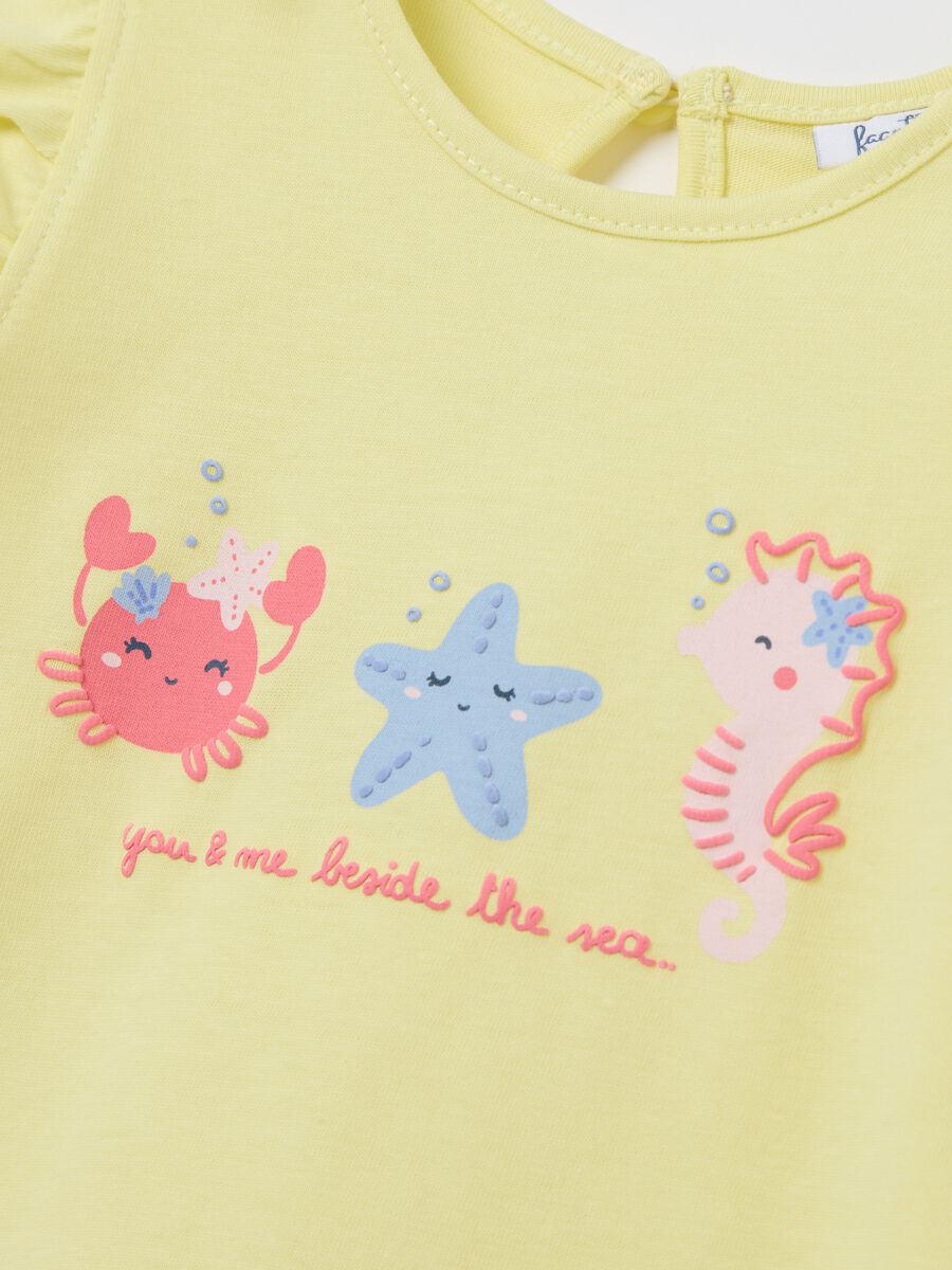 Yellow tank top in cotton with print and flounce_2