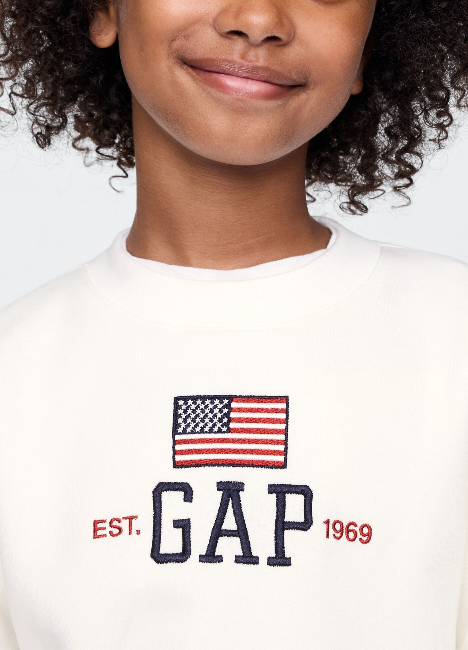 White sweatshirt with logo and flag print
