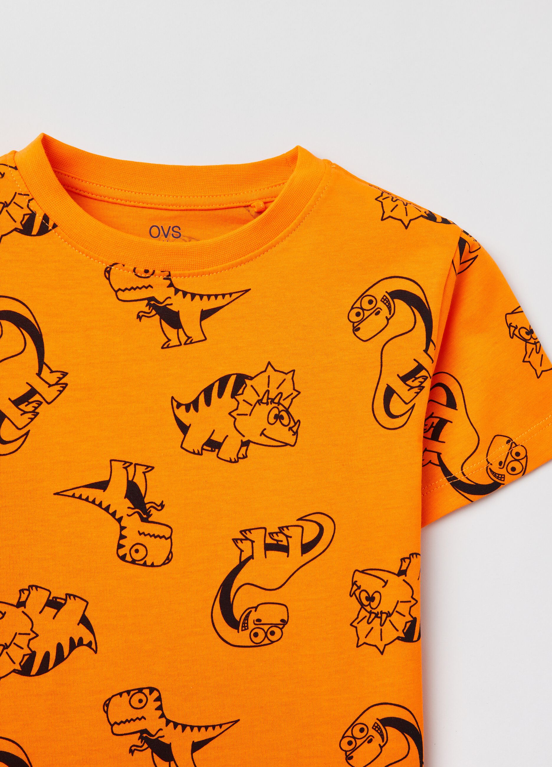 T-shirt con stampa dinosauri all-over