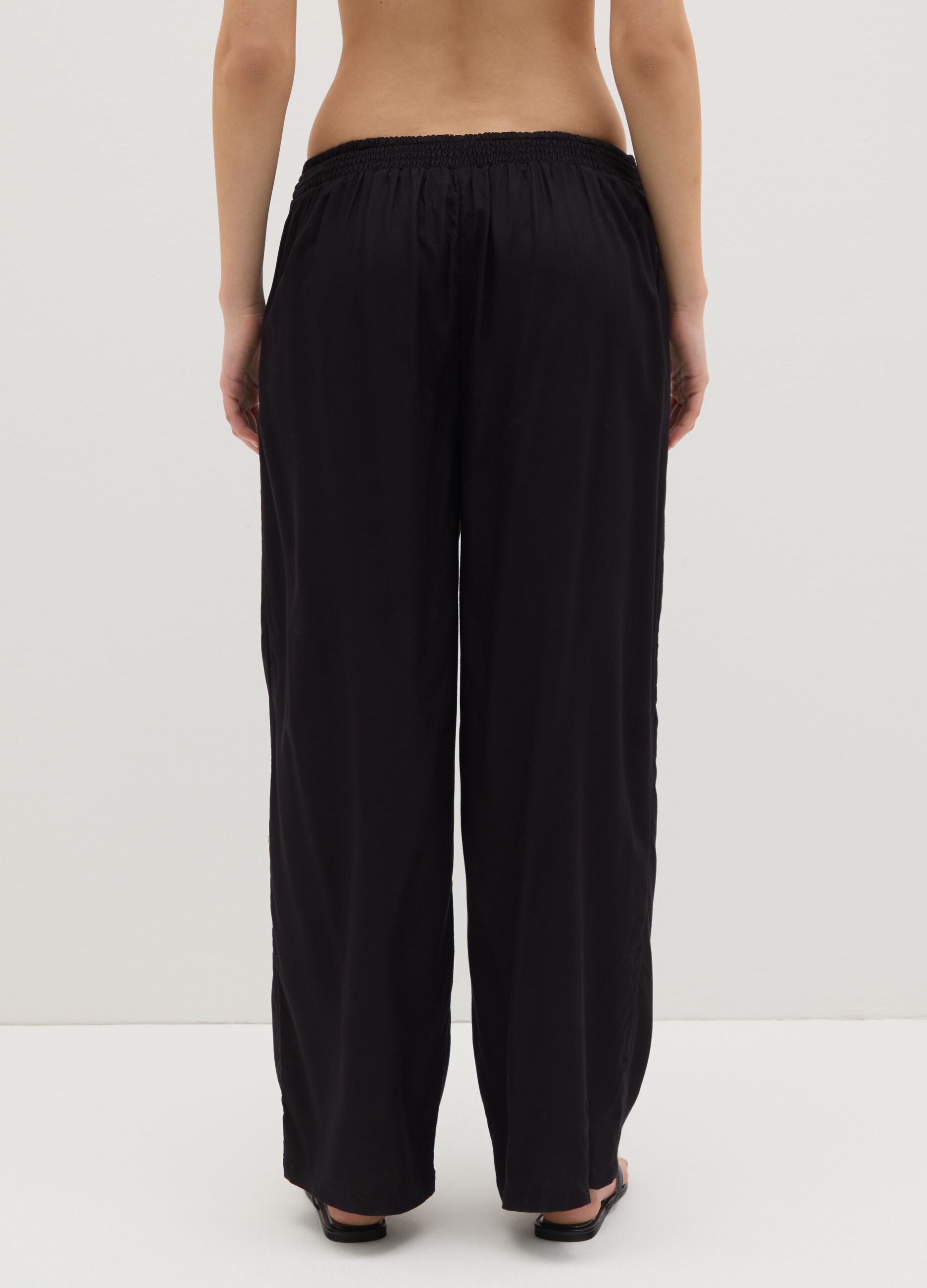 Long black beach cover-up trousers with drawstring