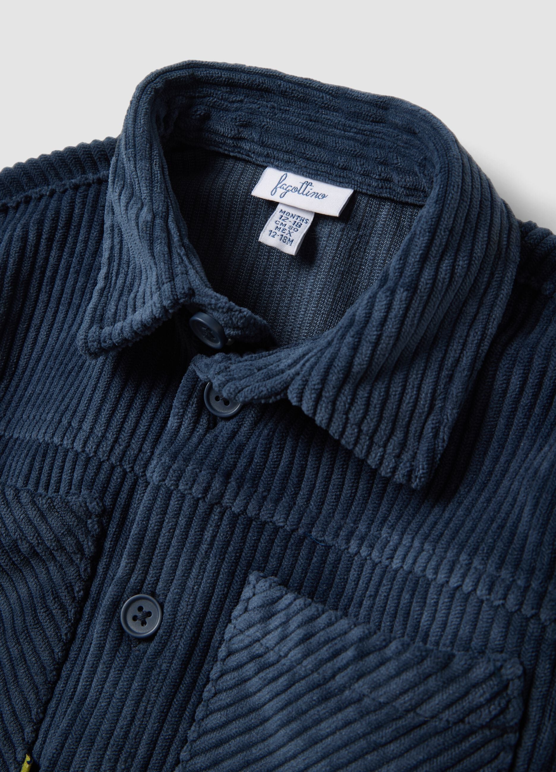 Blue ribbed shacket with buttons and classic collar