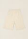 White broderie cotton trousers for baby girls_2