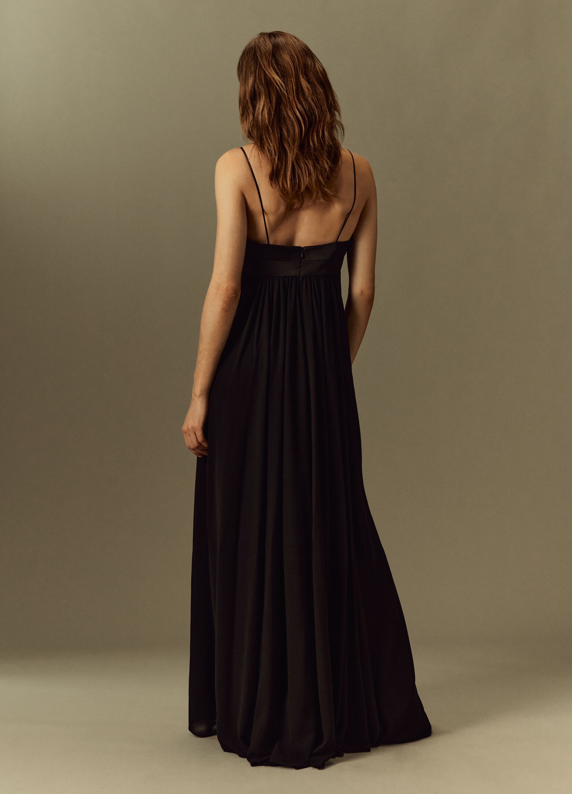 Long dress with spaghetti straps.
