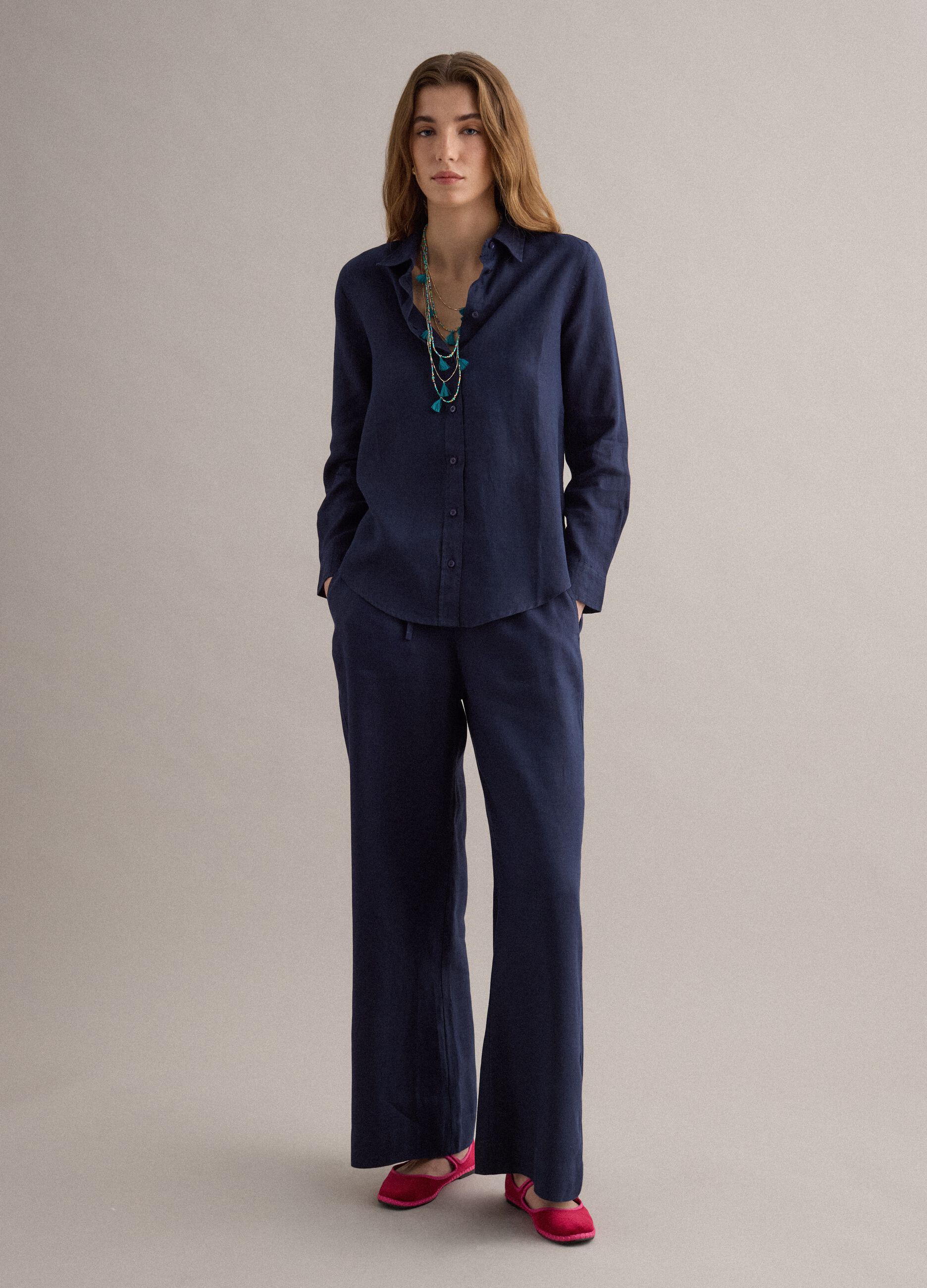 Multicolour necklace with light-blue tassels