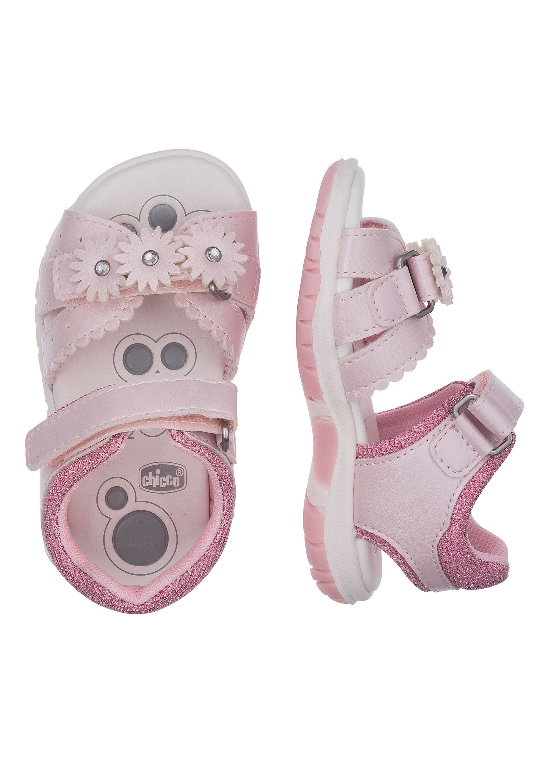 Pink girl's sandals with hook-and-loop closure and floral decorations