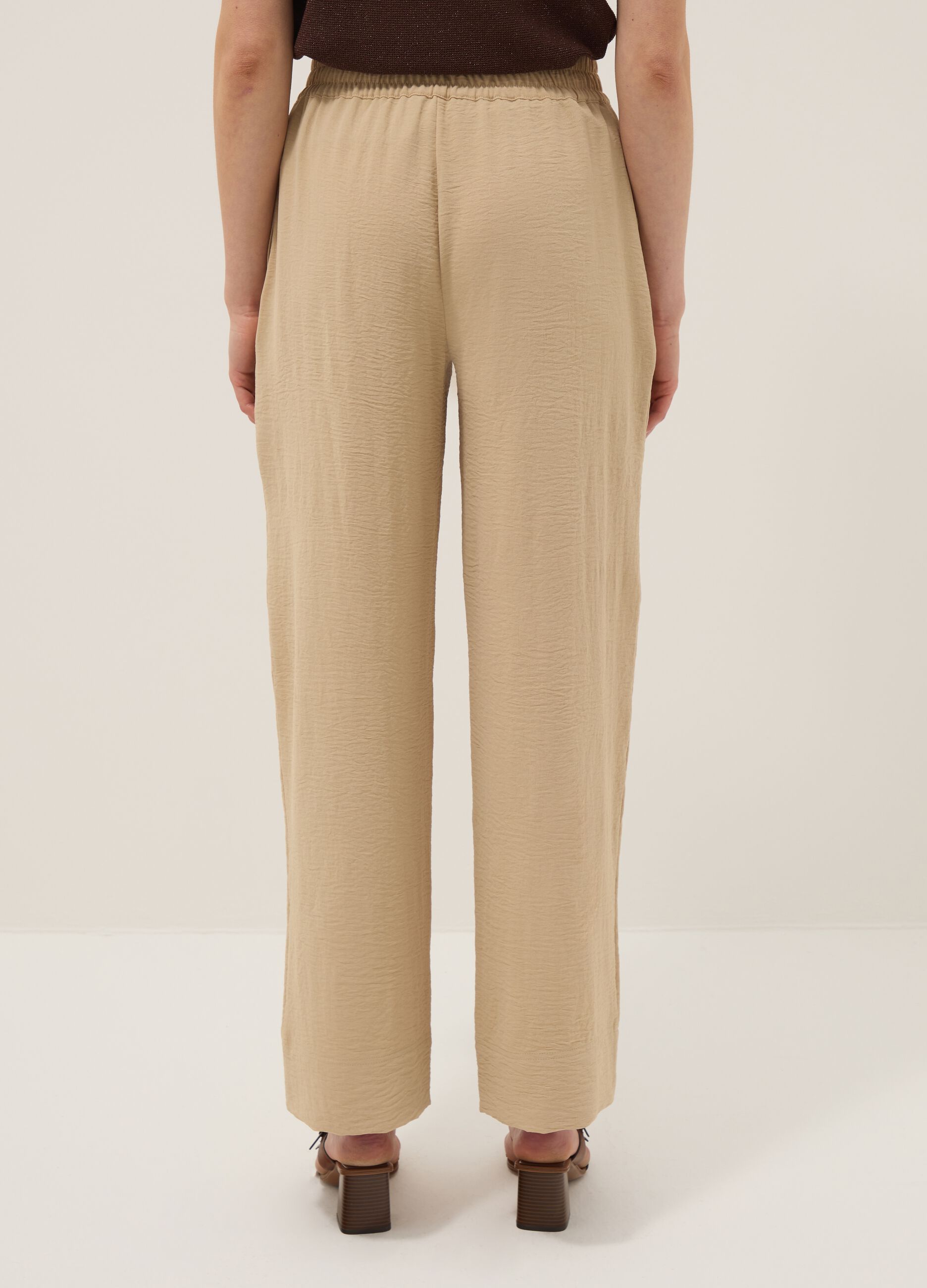 Beige wide-leg trousers with elasticated waist