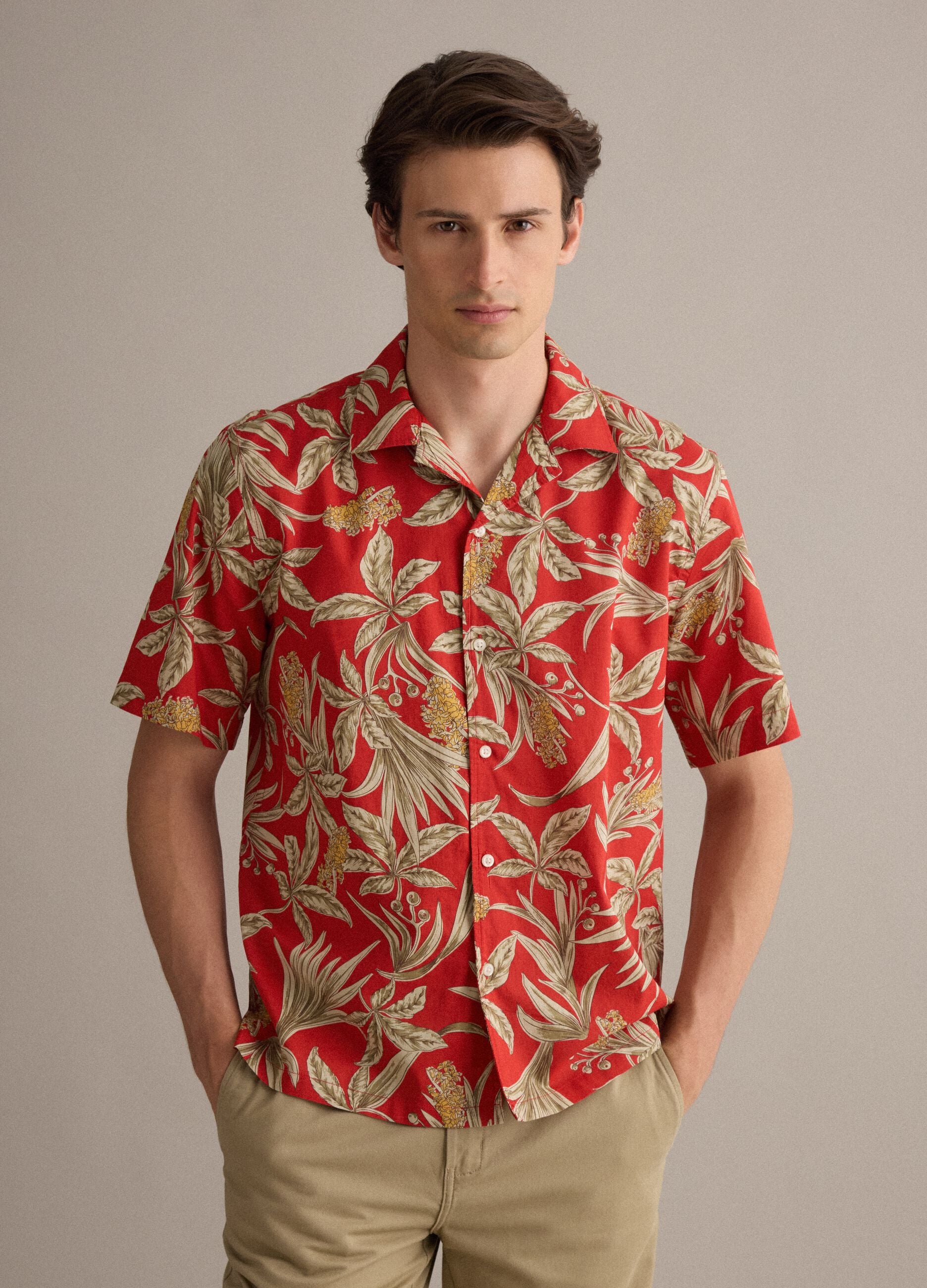 Red organic cotton shirt with tropical print
