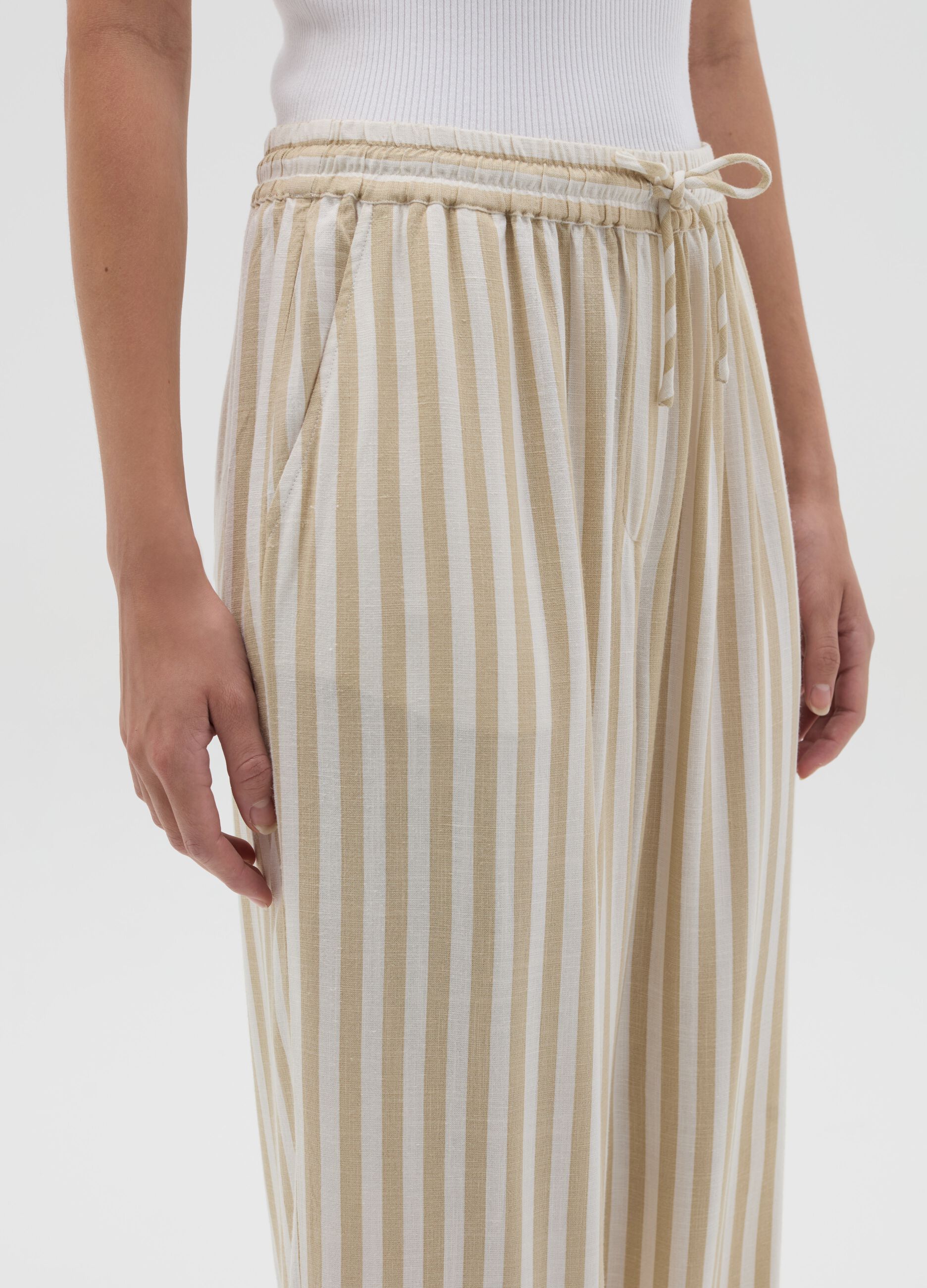 Striped beige palazzo trousers in viscose and linen