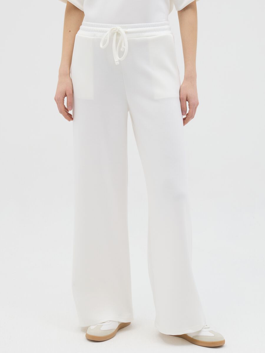 White palazzo trousers in stretch fabric_1