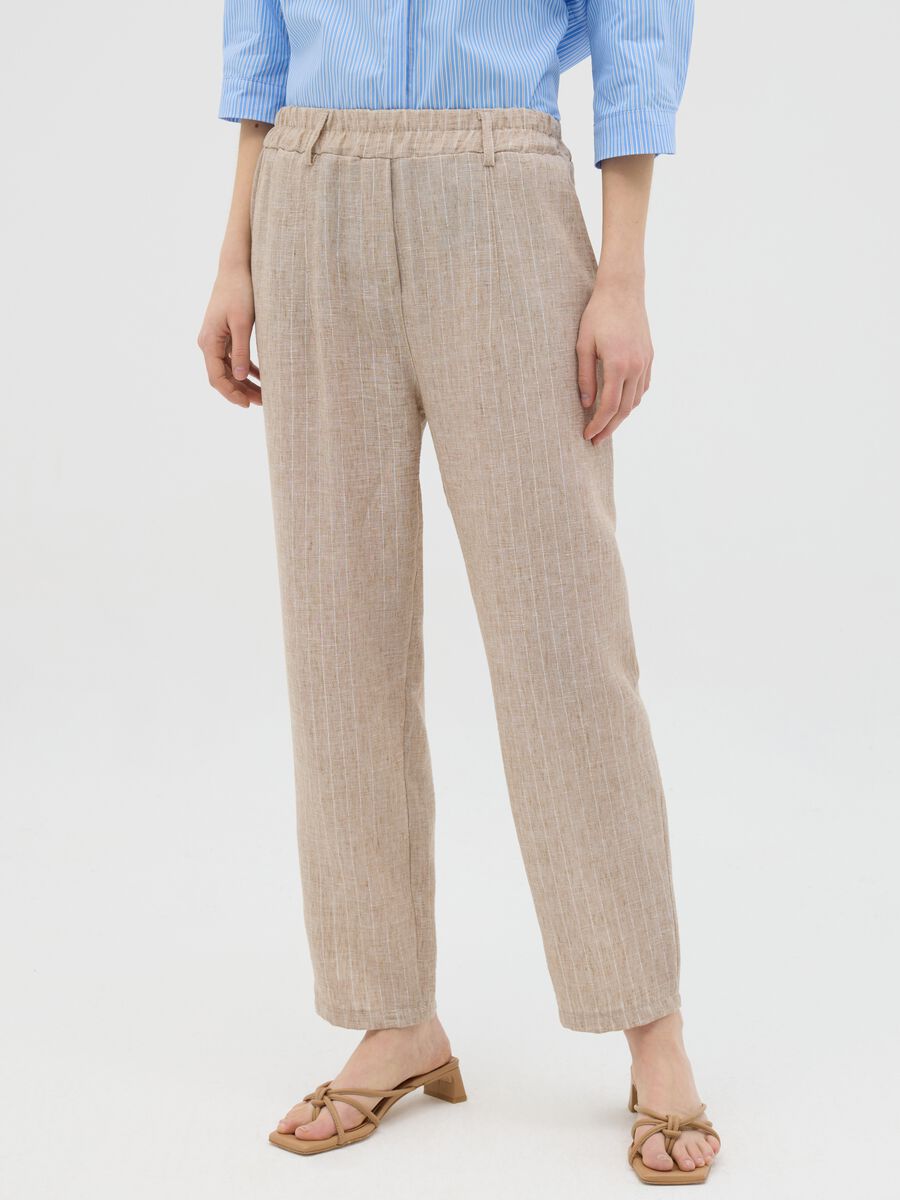 Beige trousers in stretch fabric_1