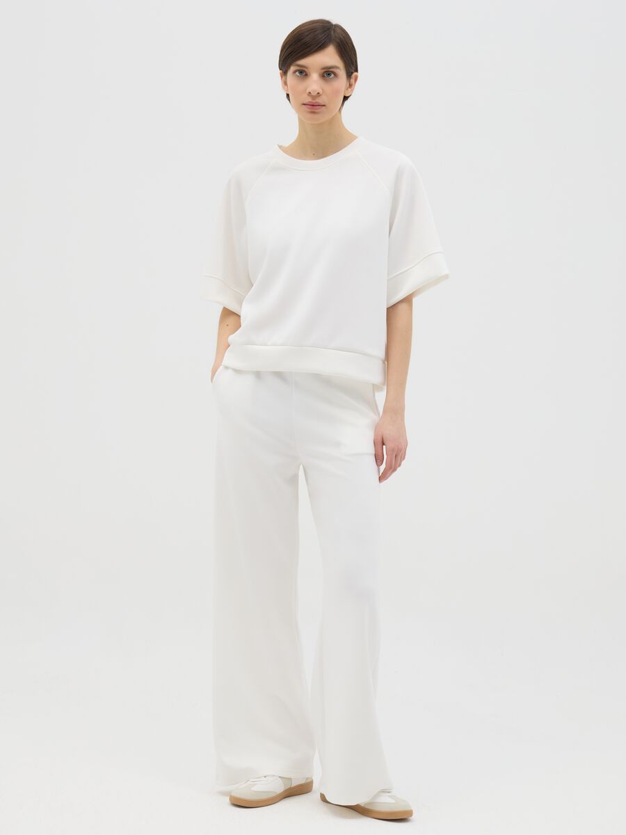 White palazzo trousers in stretch fabric_0