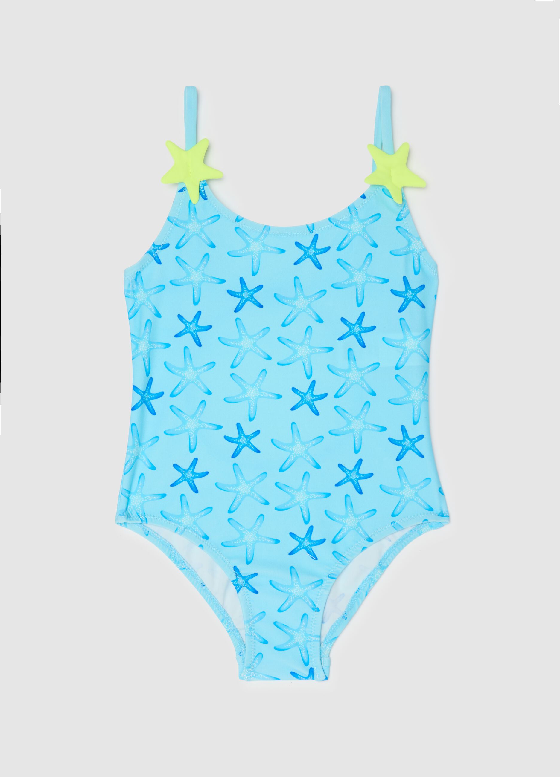 Girls’ one-piece swimsuit in light blue stretch fabric with starfish design