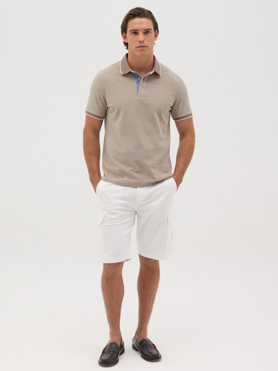 Beige polo shirt with short sleeves in cotton piquet_1