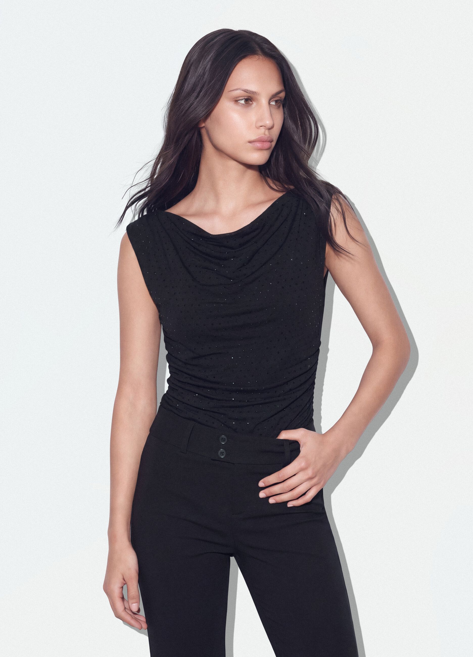 Body nero in tessuto elasticizzato con strass fitted