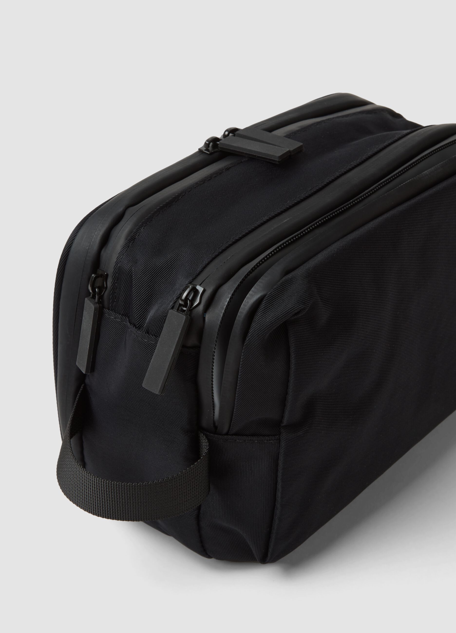 Black toiletry bag with double zip