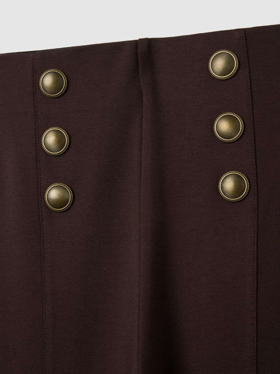 Black stretch leggings with decorative buttons_1
