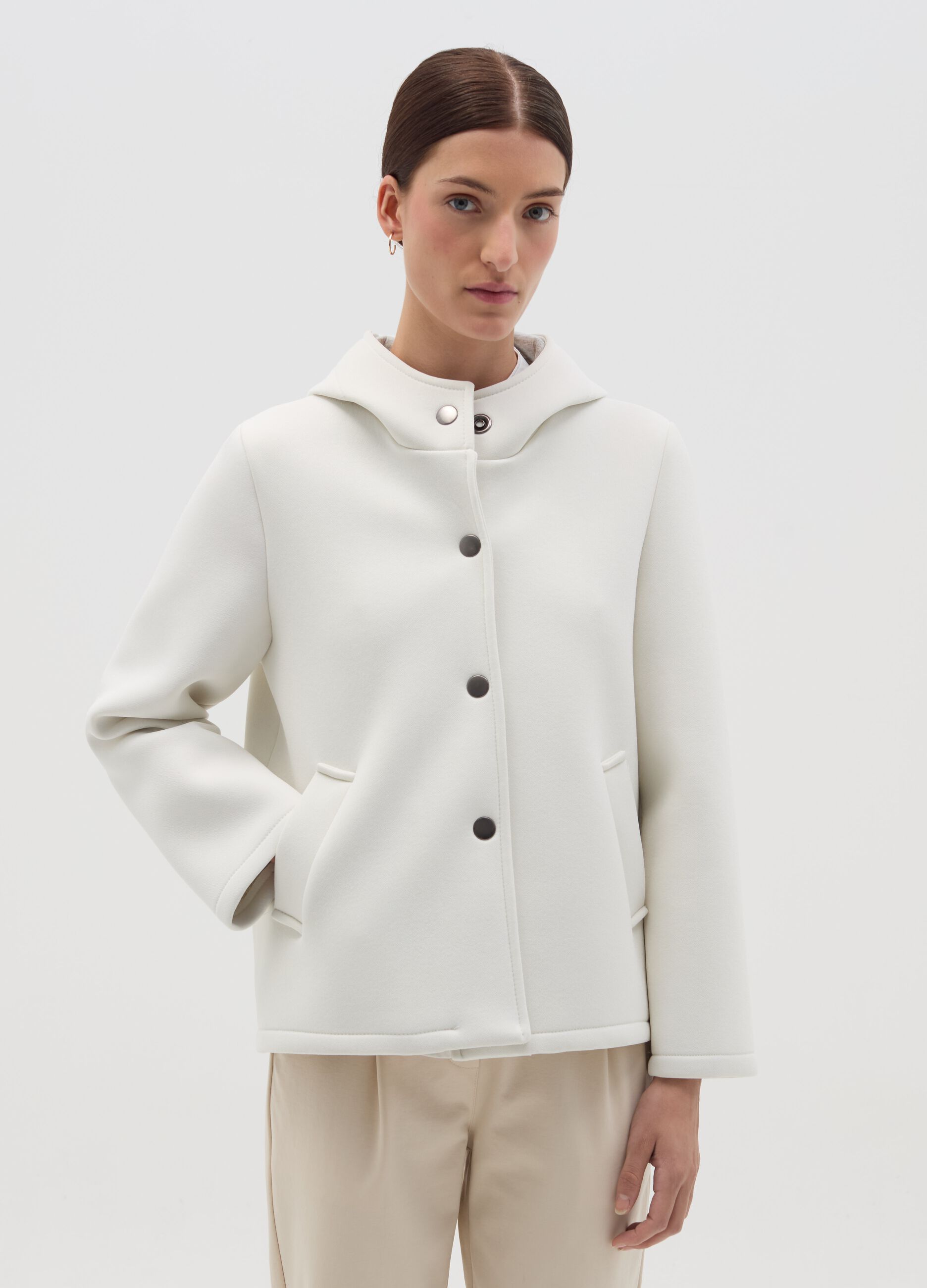 Short jacket with hood and buttons