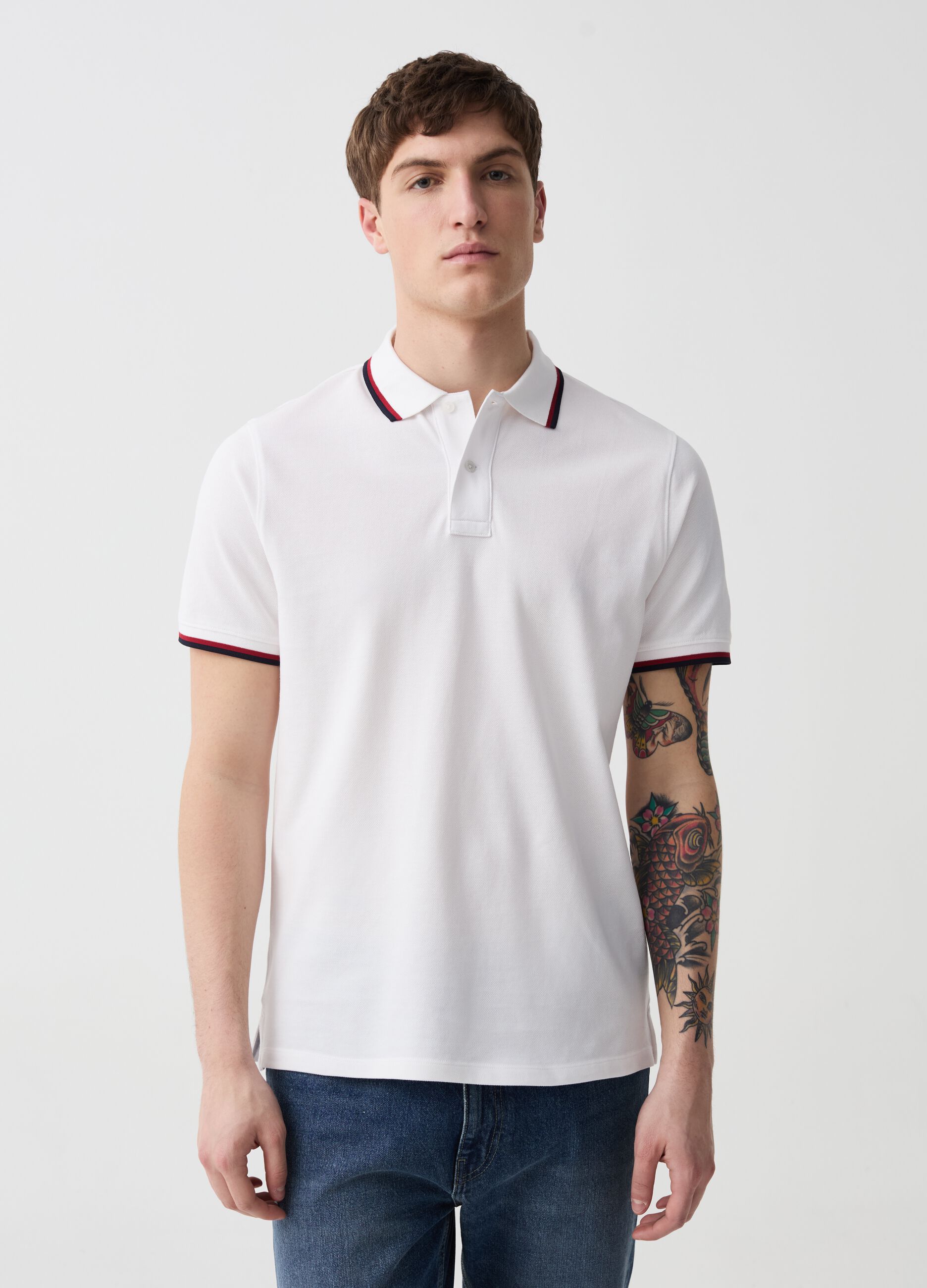 Polo shirt in piquet with striped edging