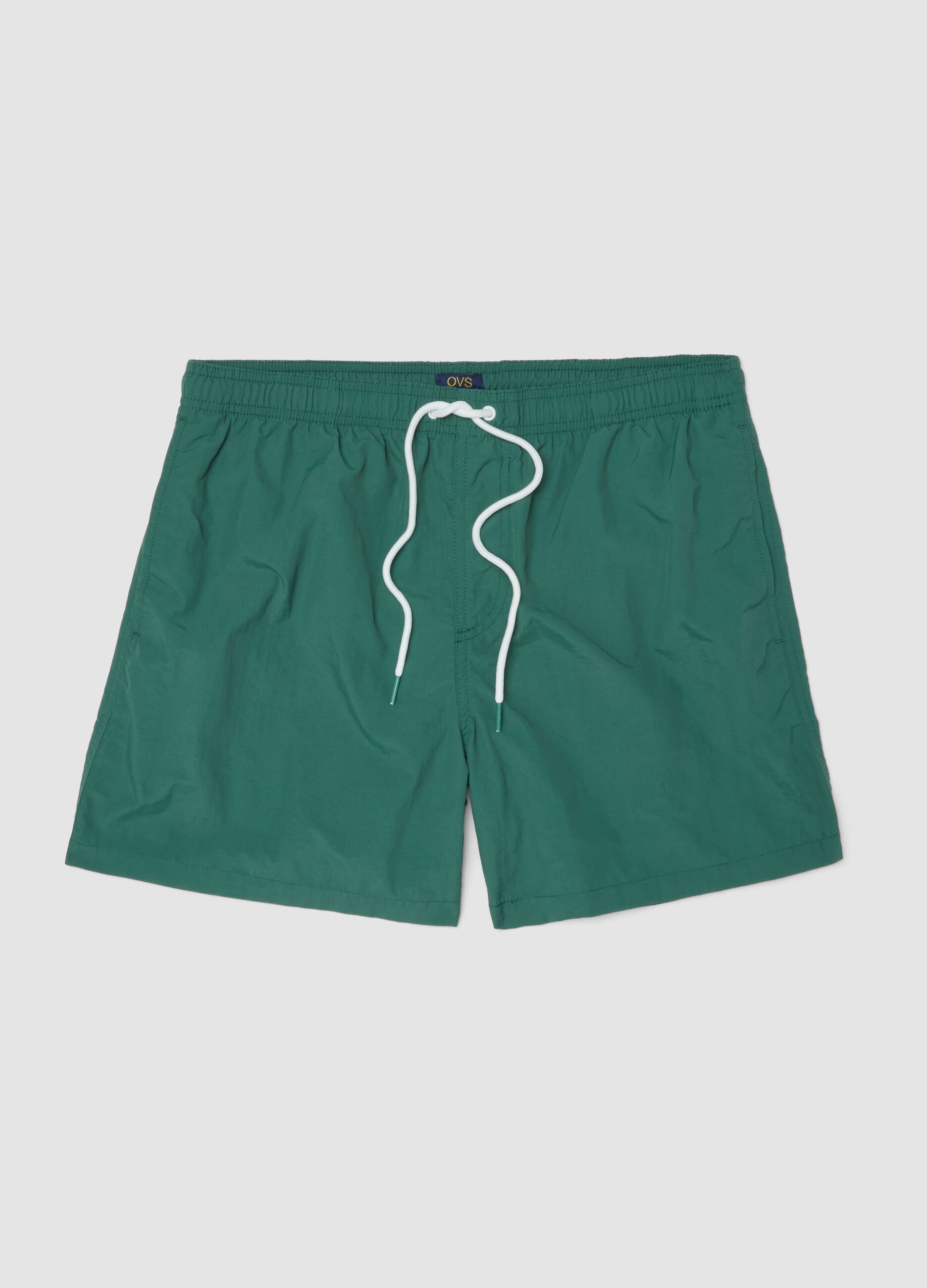 Green swim shorts with elasticated waist