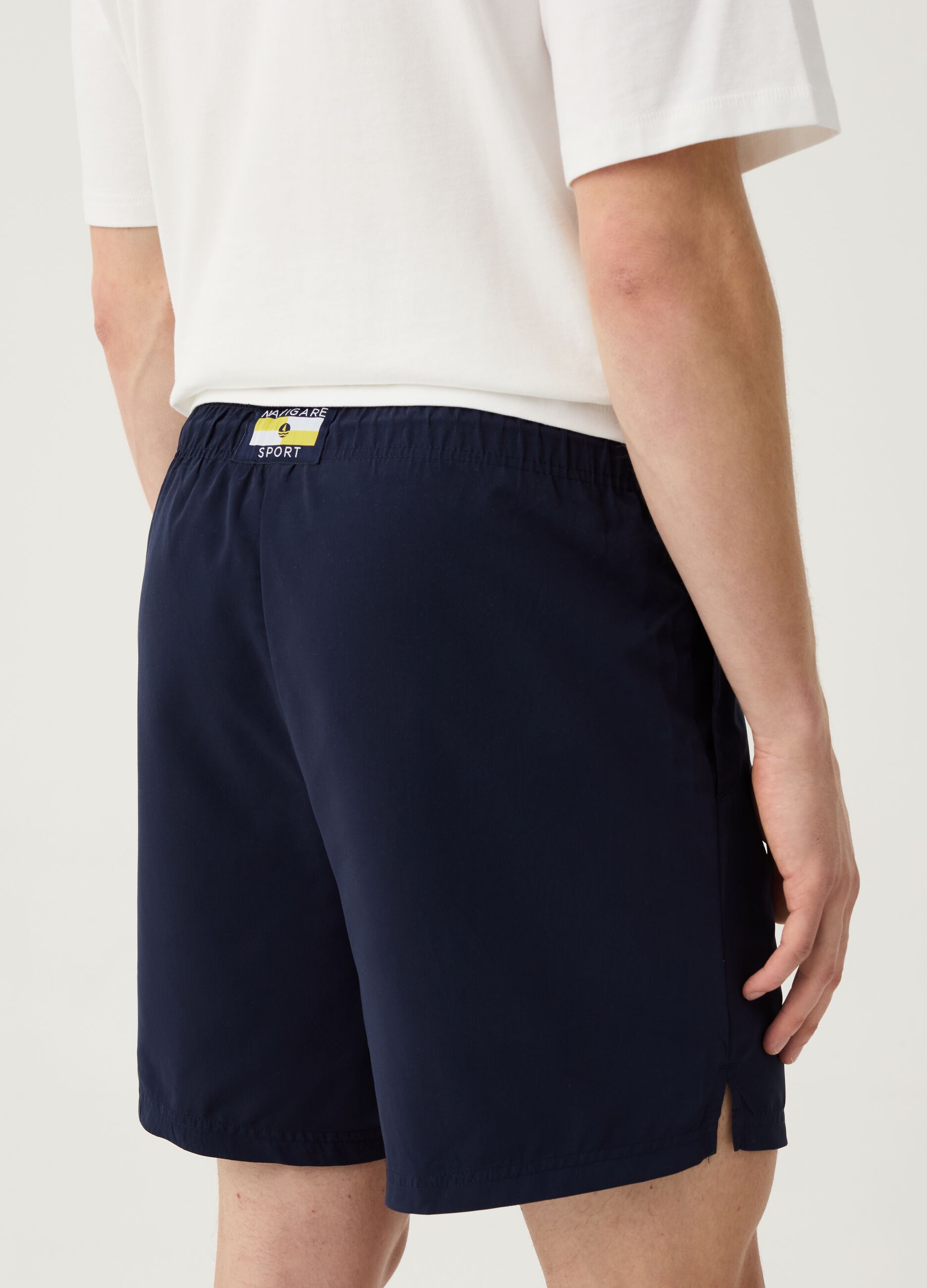 Bermuda joggers with Navigare Sport logo patch