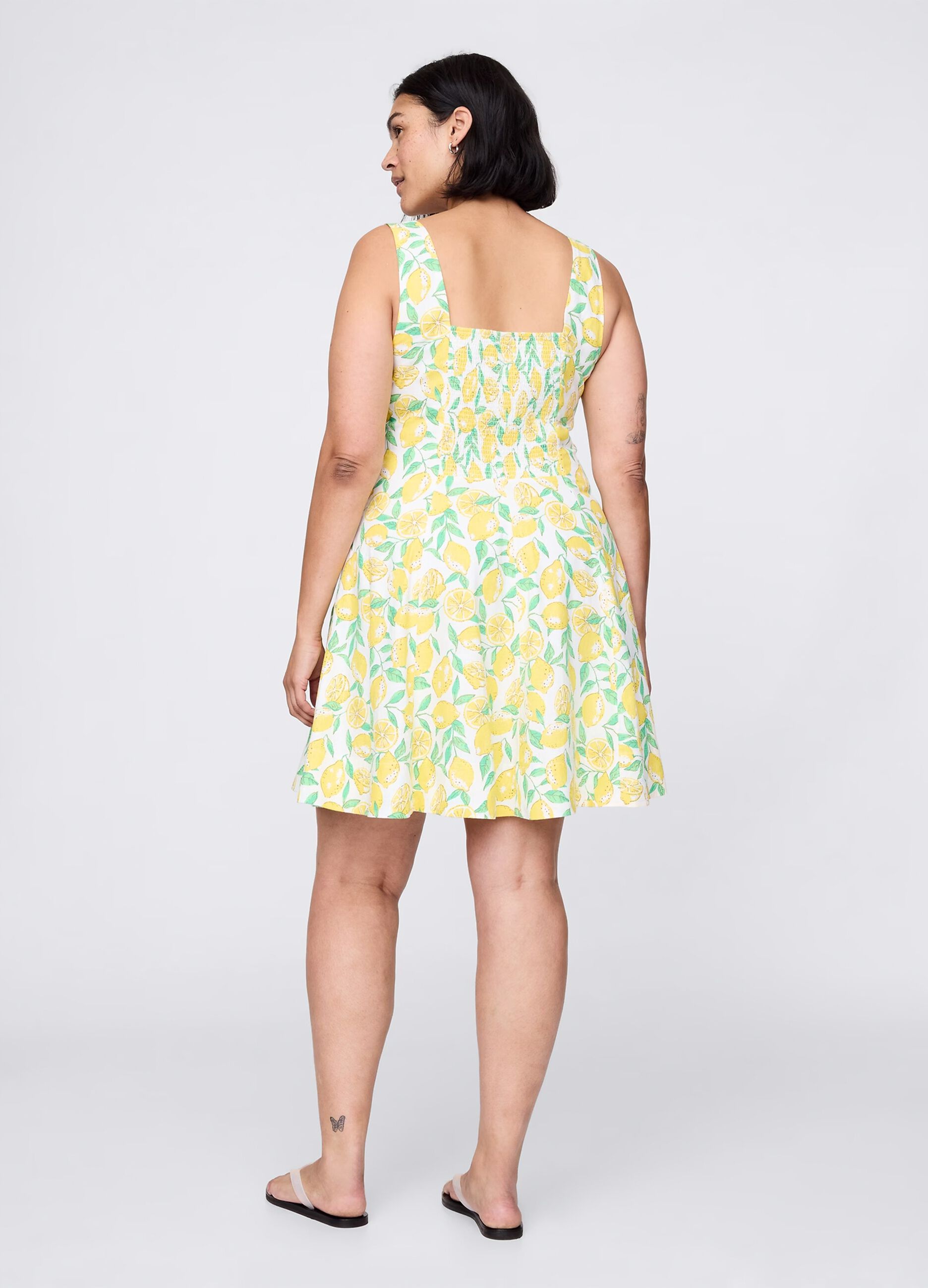 Short multicoloured dress with lemons pattern