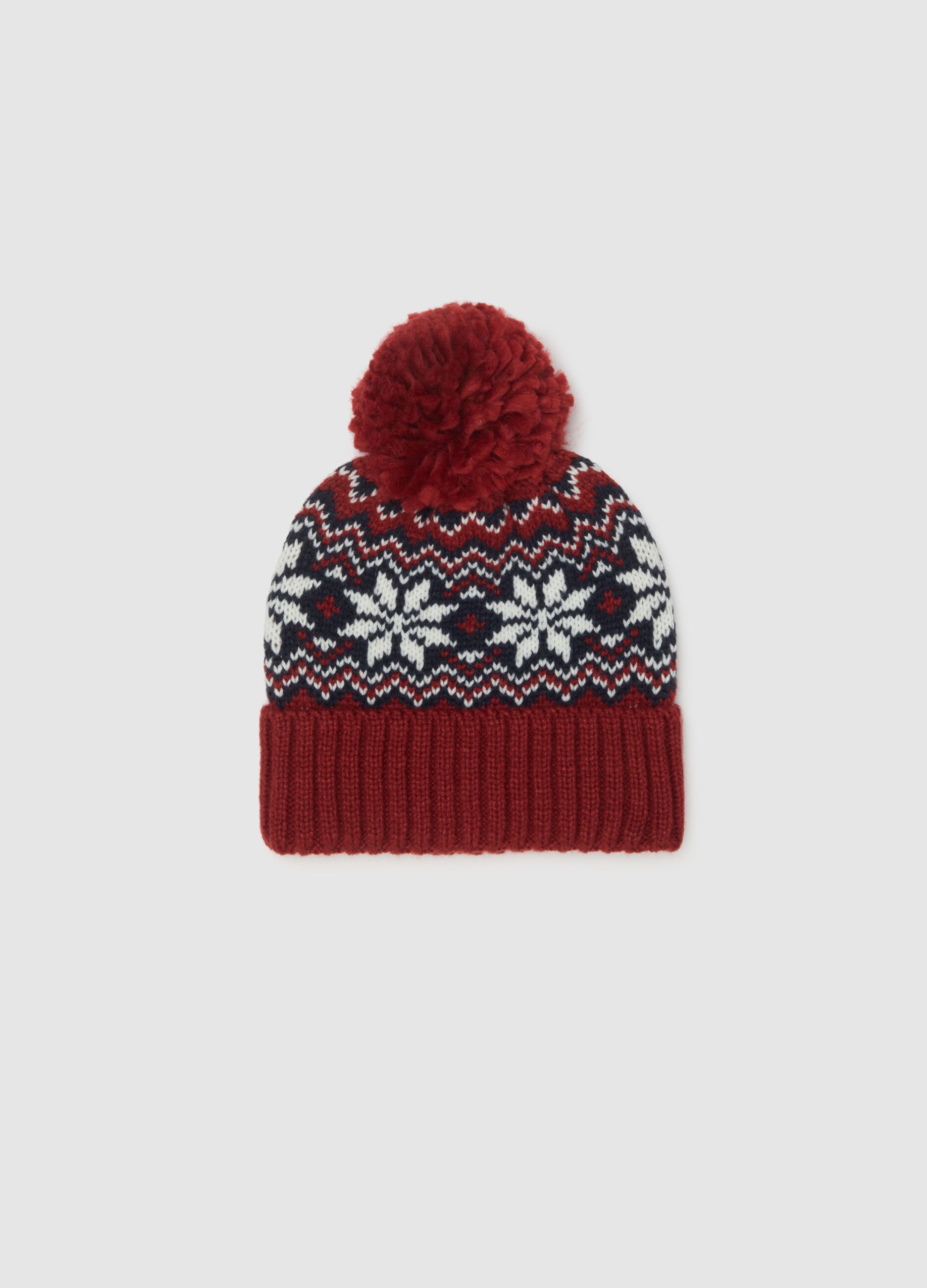 Children's hat with pompom and embroidered details