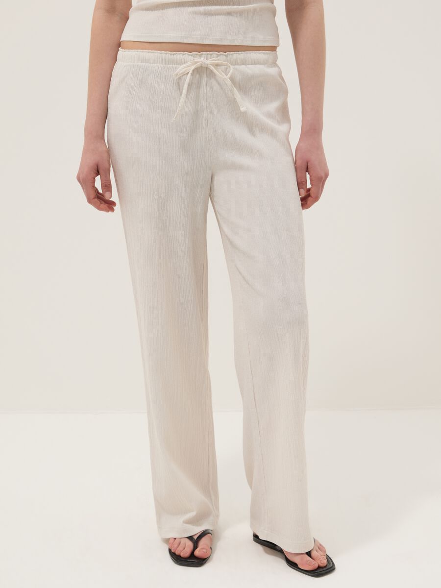 Beige stretch-fabric palazzo trousers_1
