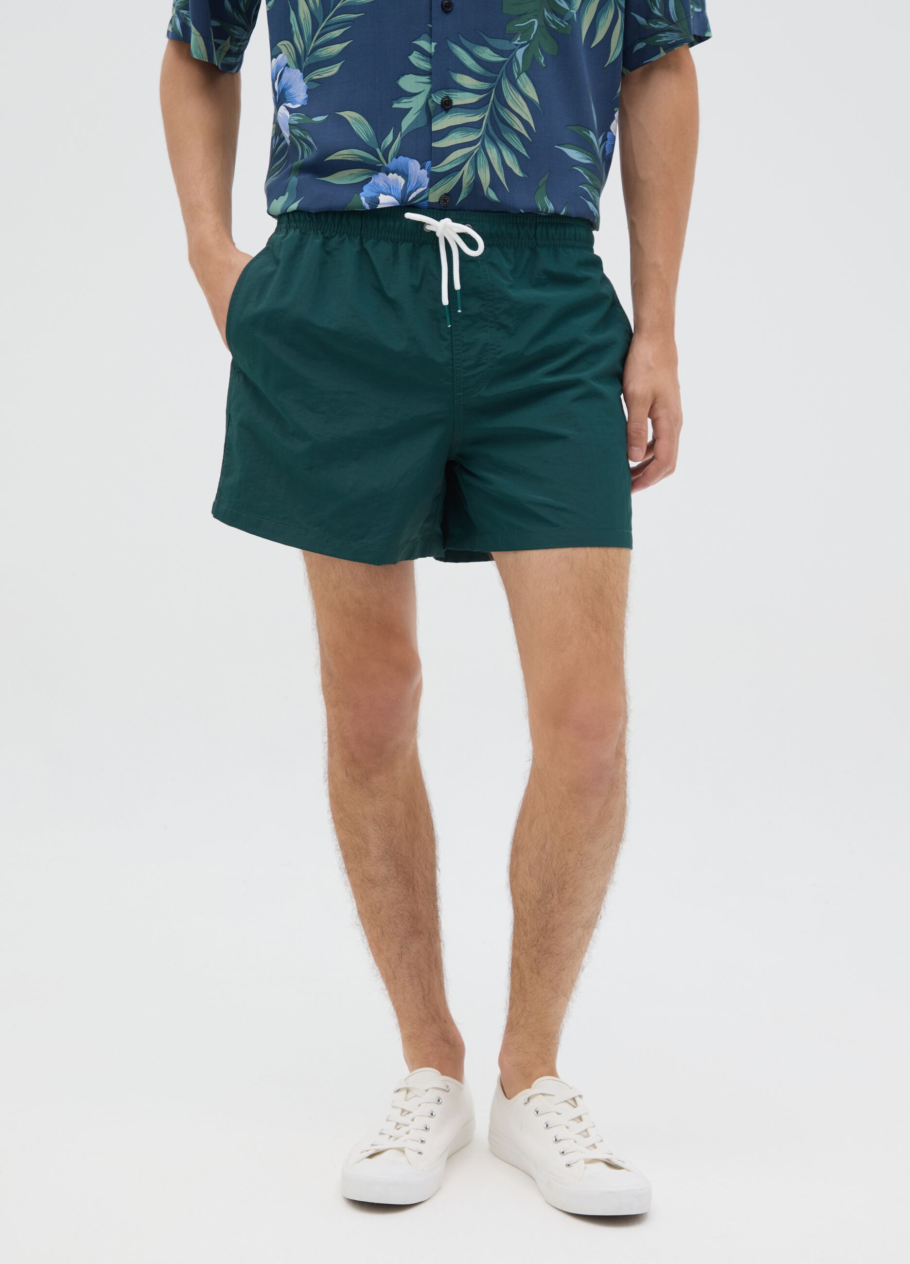 Green mixed fabric swim shorts