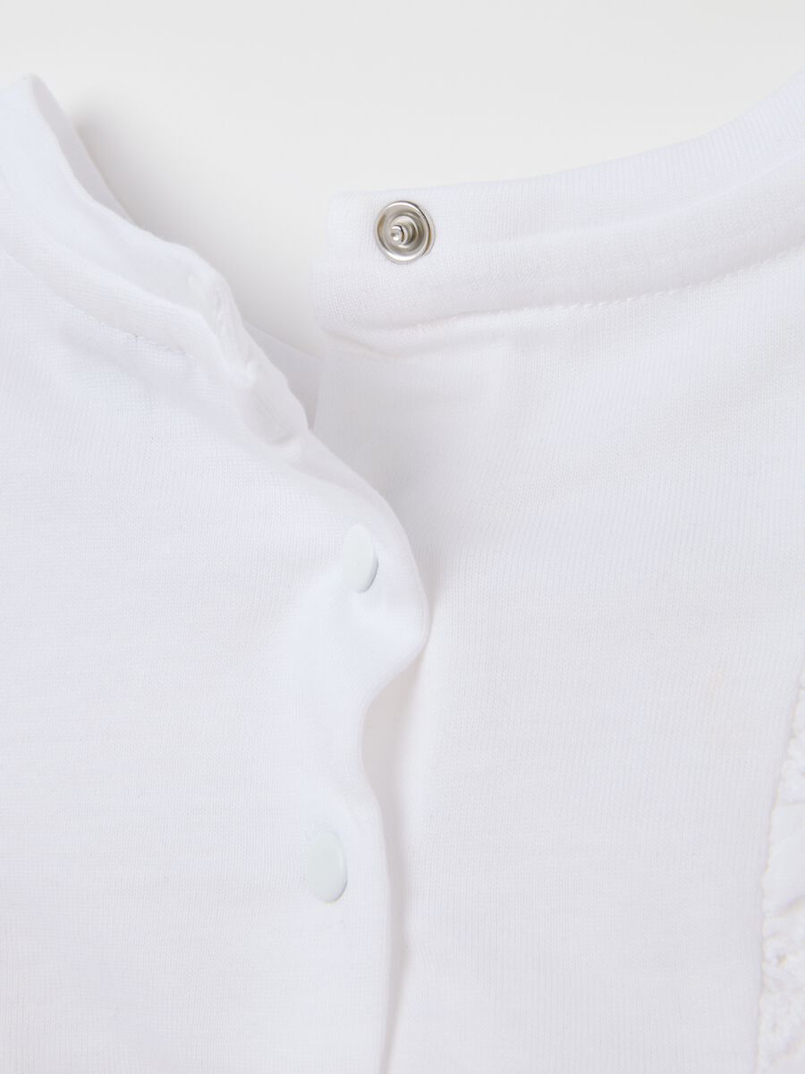 Baby girl's dress in pure white cotton with ruffles_3