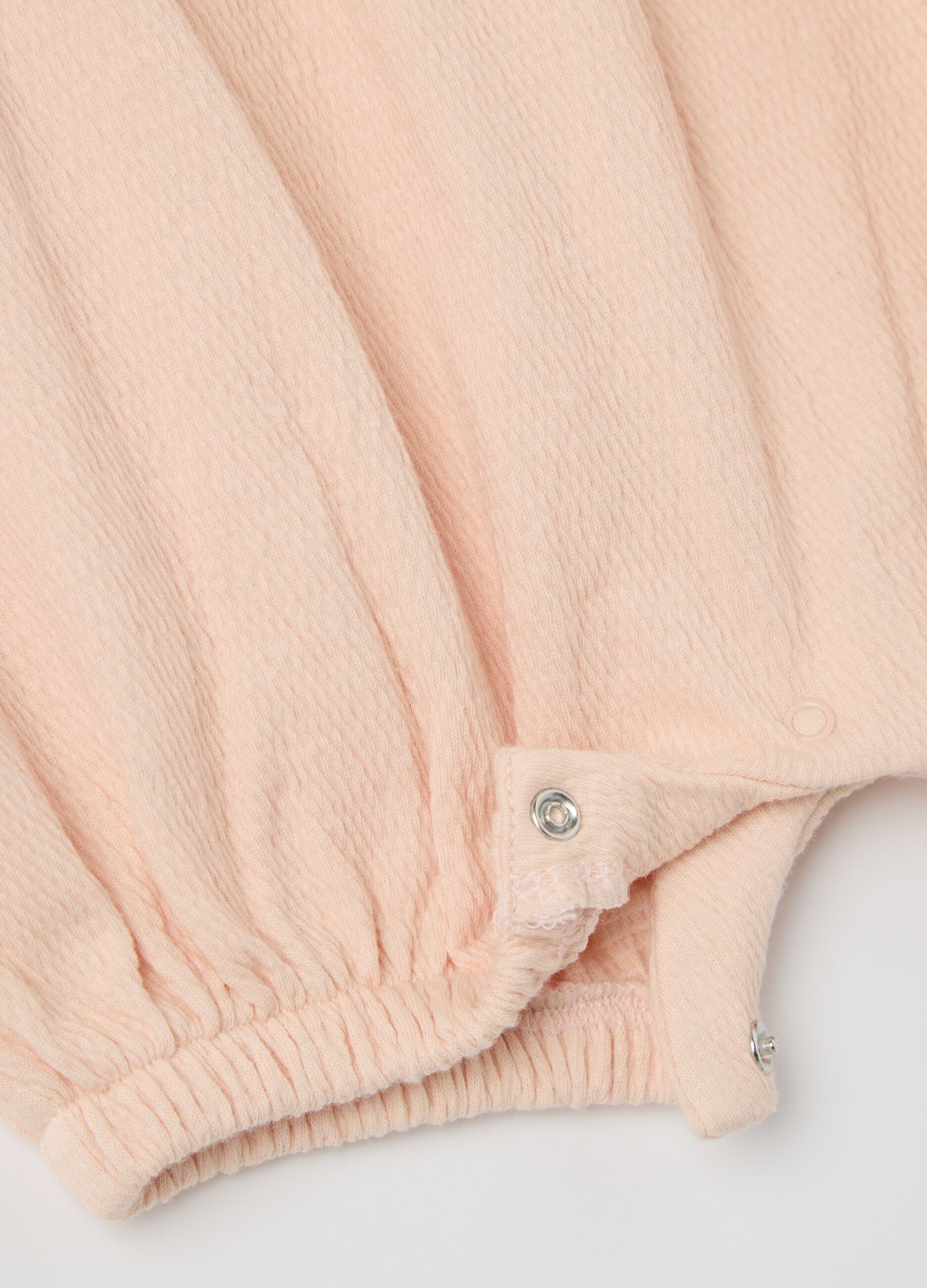 White and orange romper suit with kitten embroidery