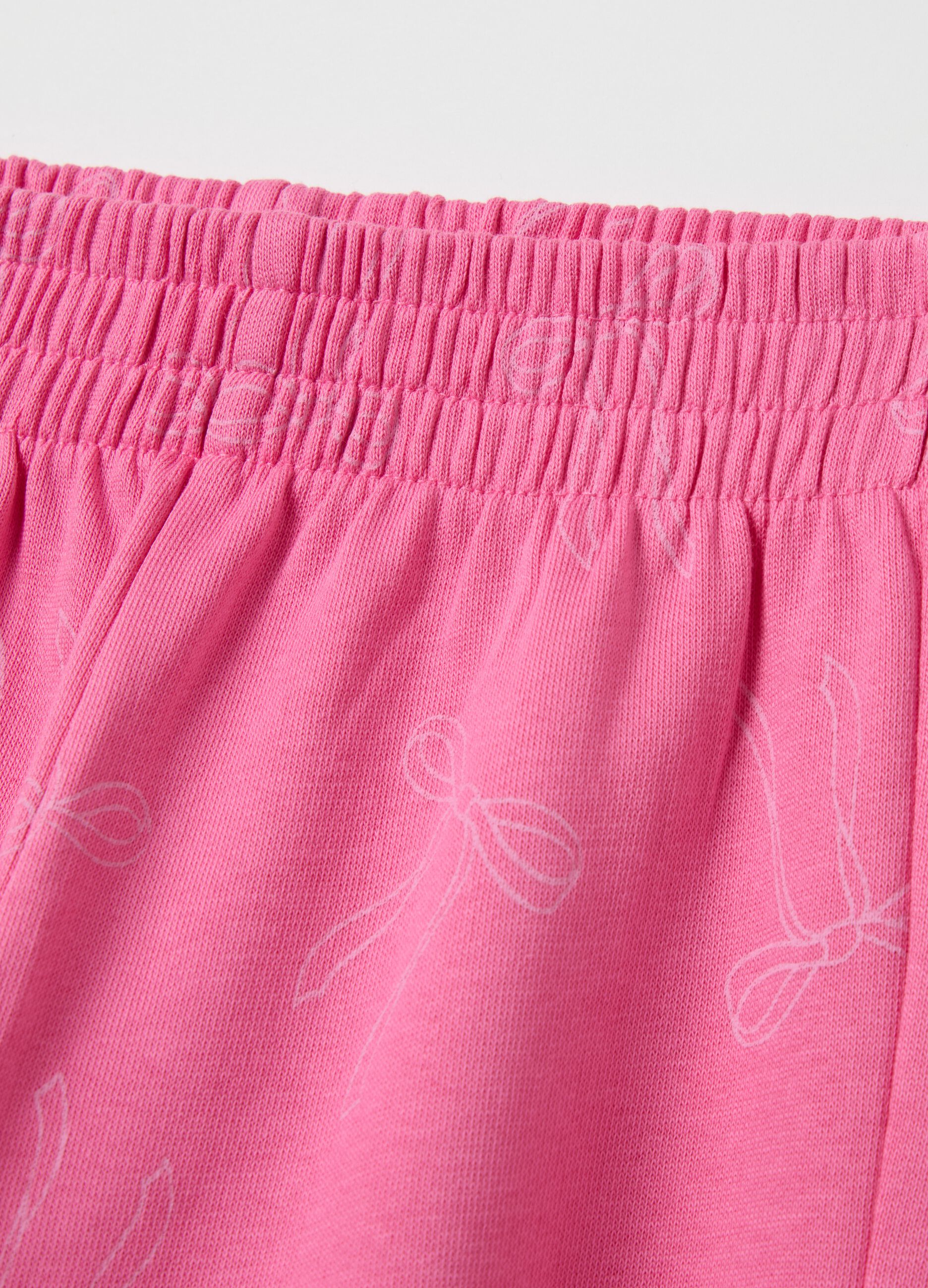 Joggers in cotone con profili elasticati e stampa 
