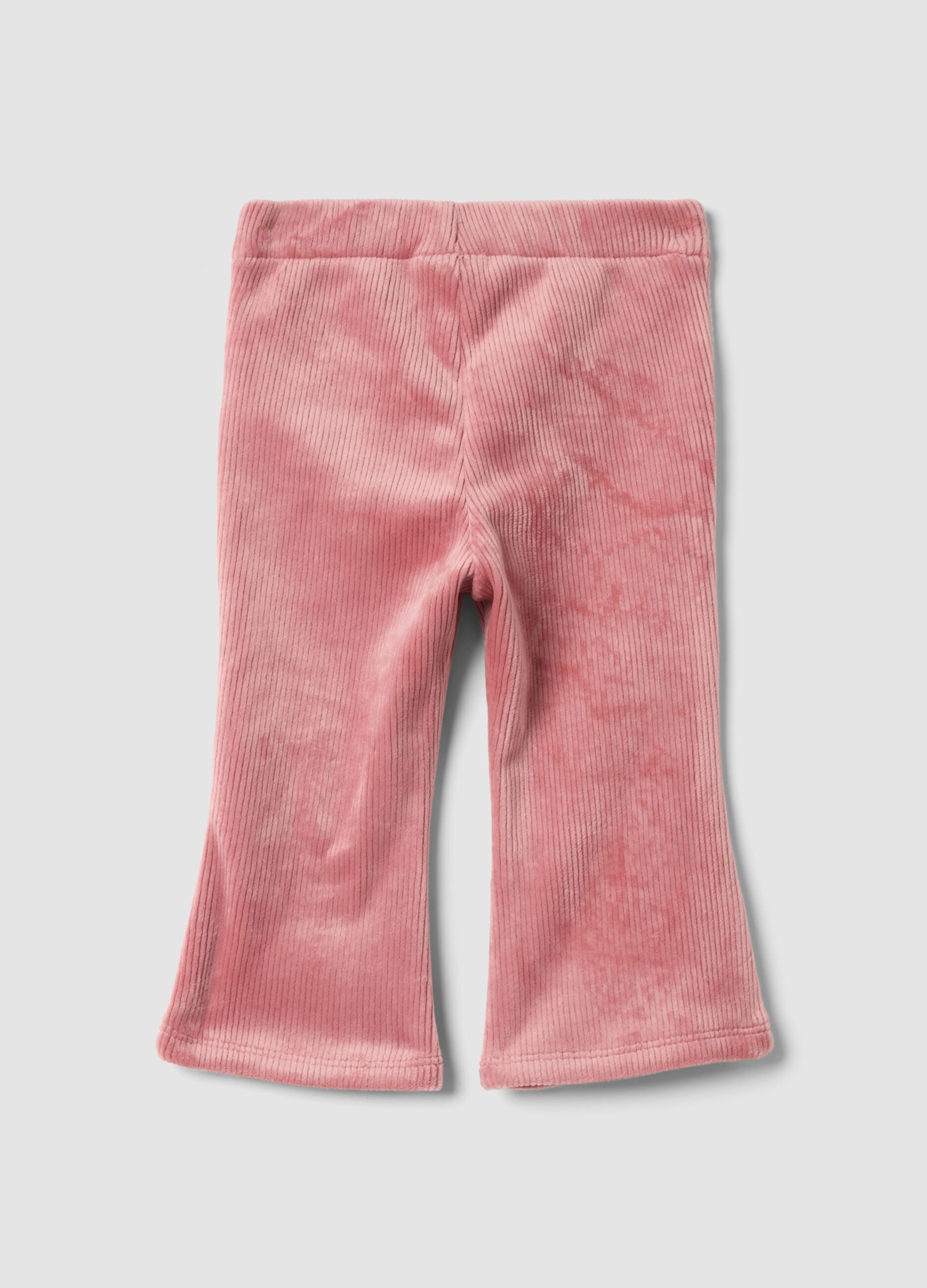 Pantaloni flare rosa in tessuto elasticizzato a costine