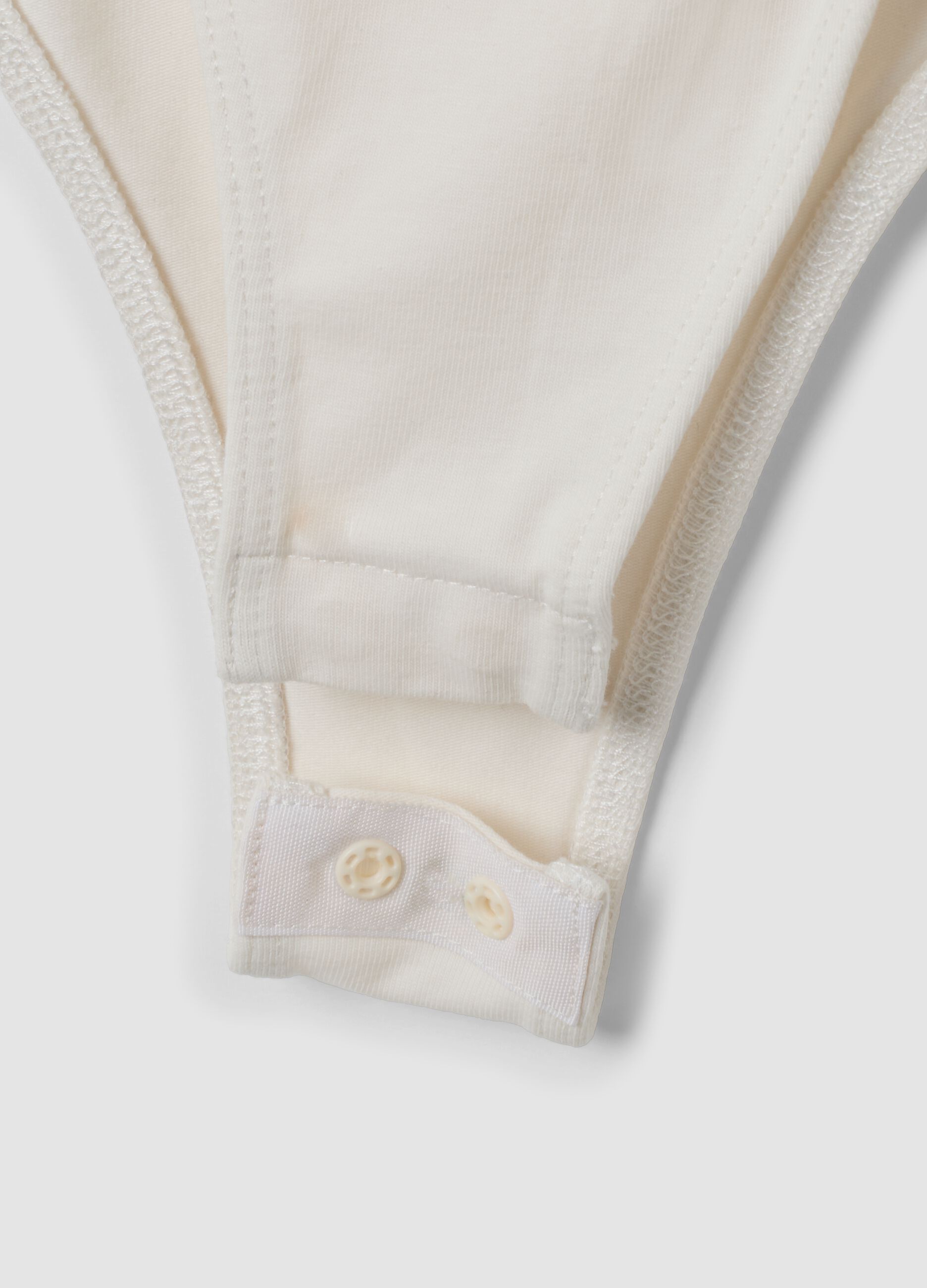 White fitted stretch-cotton bodysuit with lace