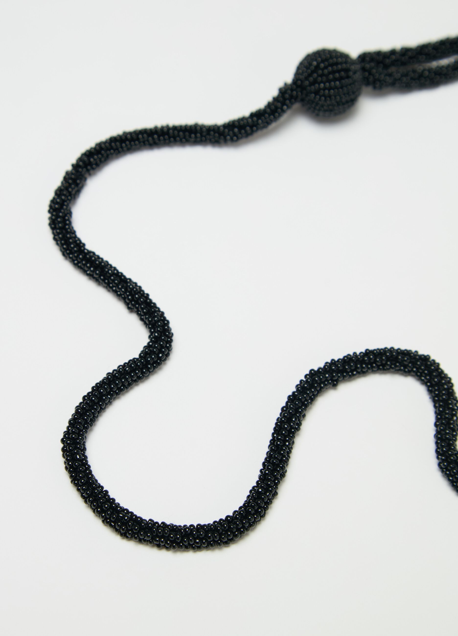 Long double-strand necklace with beads