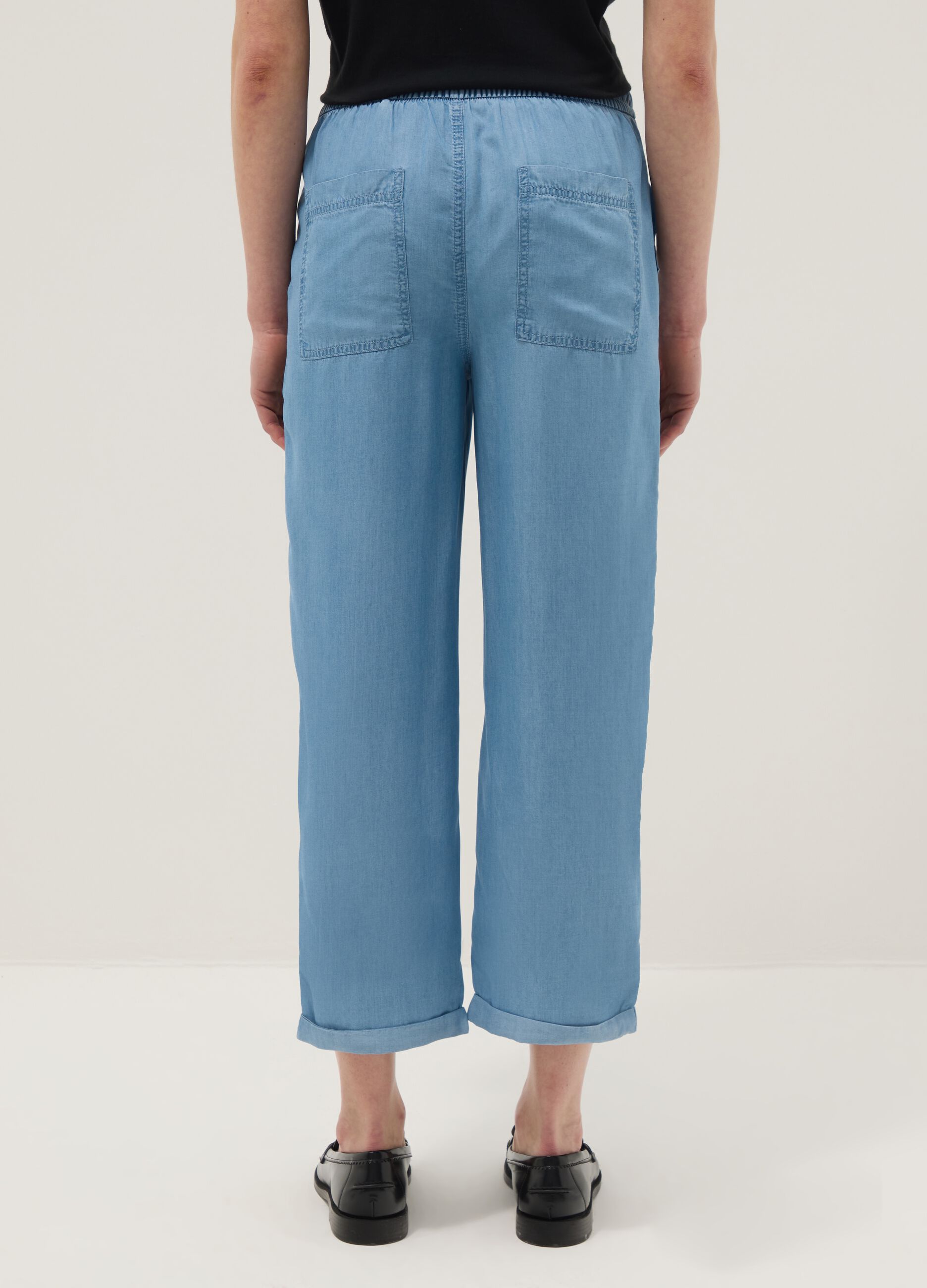 Light blue denim jeans in pure lyocell with elasticated waist, relaxed fit
