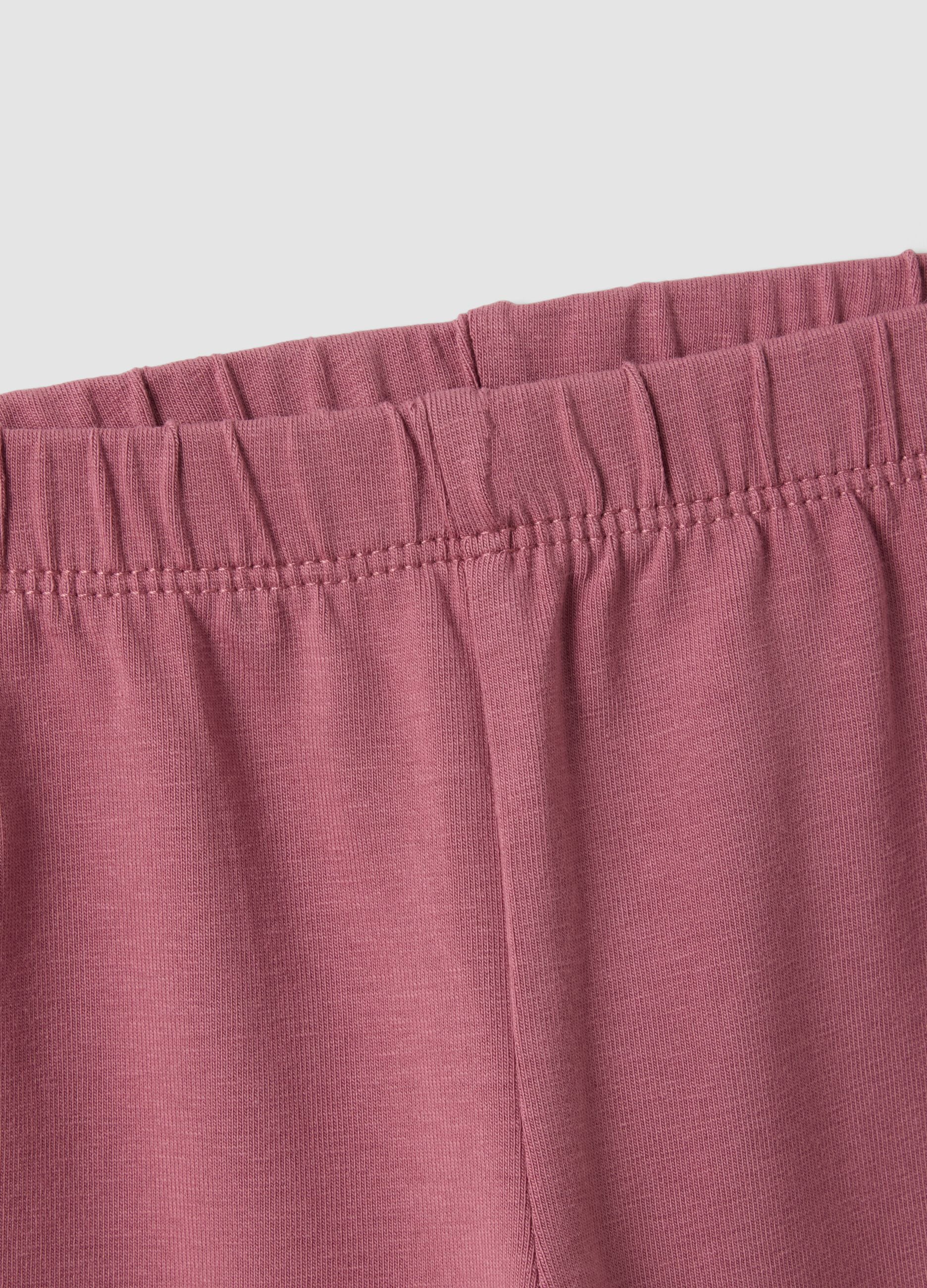 Purple flared leggings in stretchy organic cotton blend with heart print for baby girl