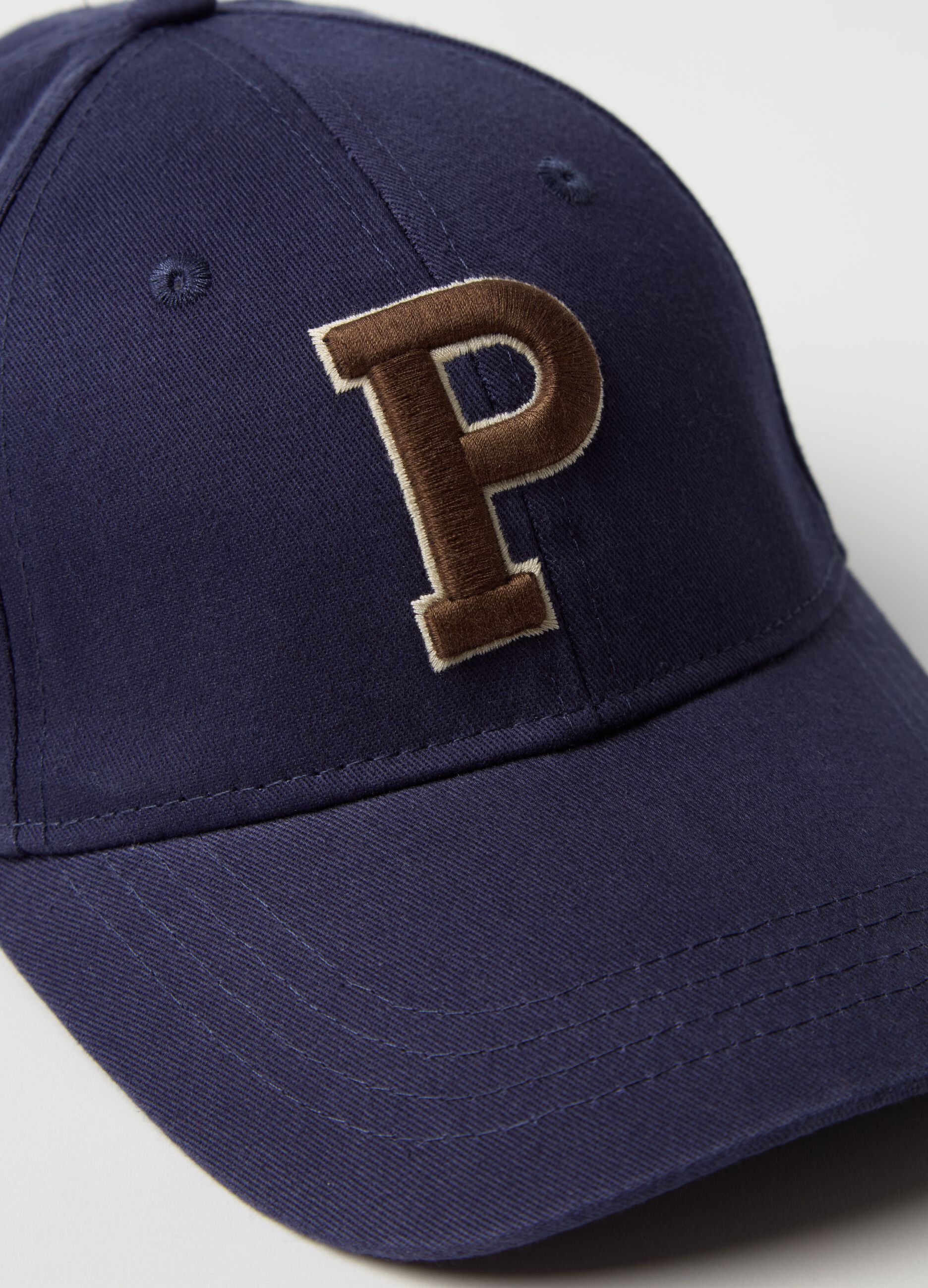 Baseball cap with embroidered logo