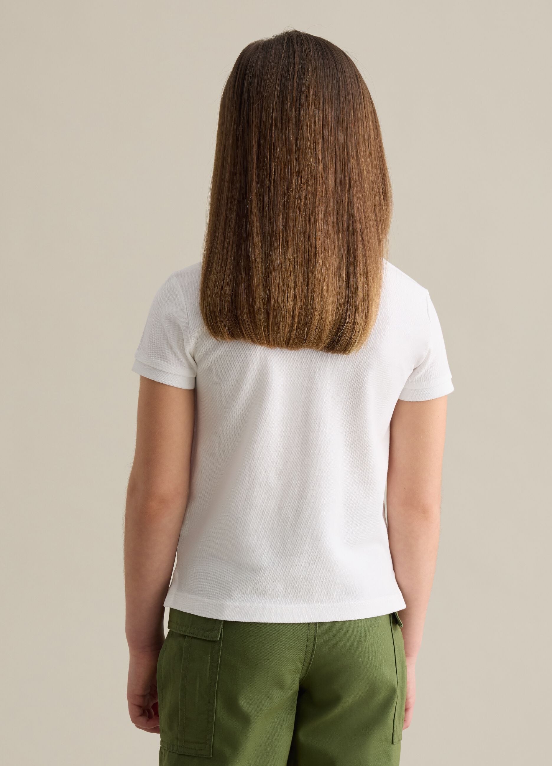 Cotton polo shirt with embroidered flowers